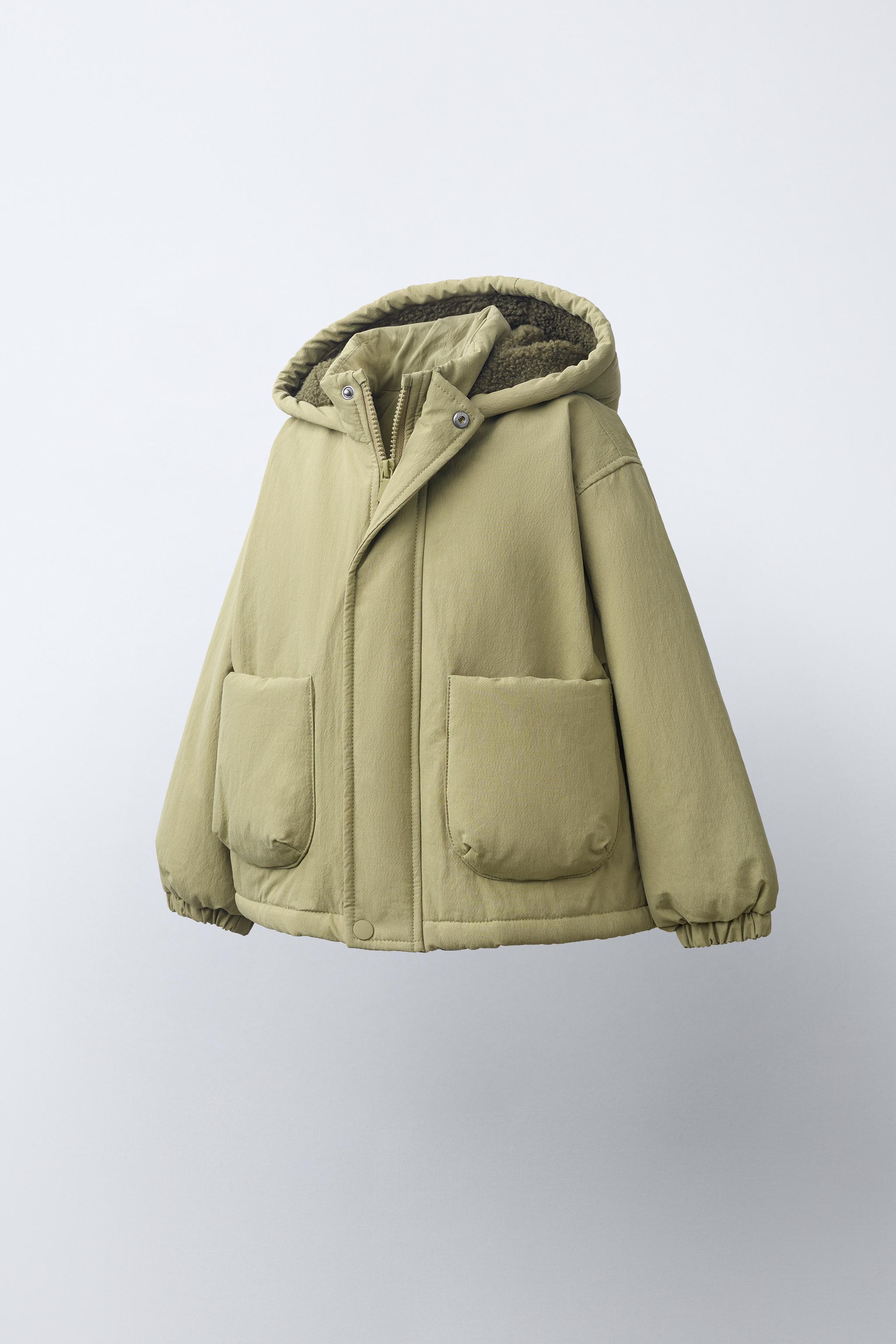 BLOUSON À CAPUCHE EFFET MOUTON