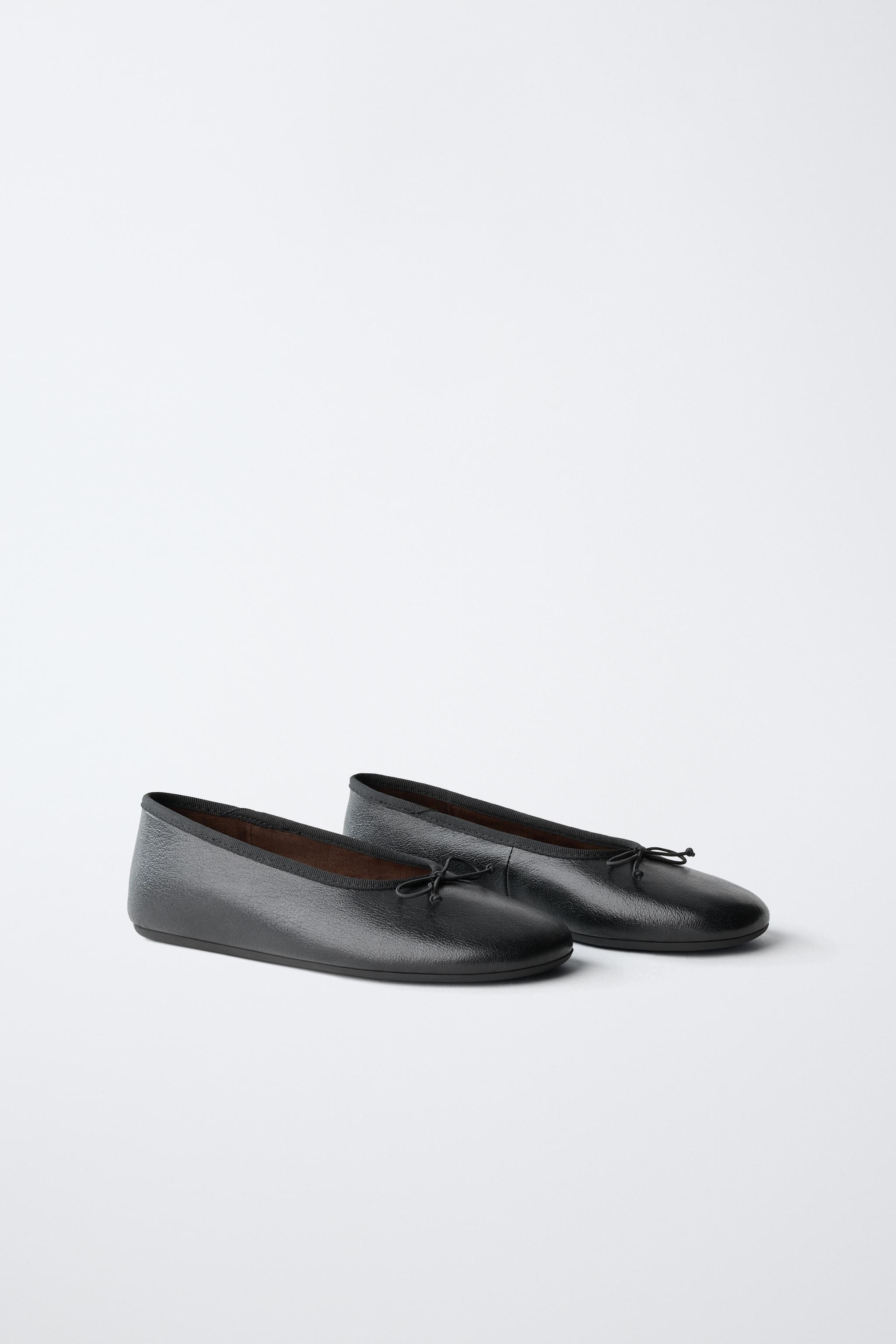 LEATHER BOW BALLET FLATS — Black