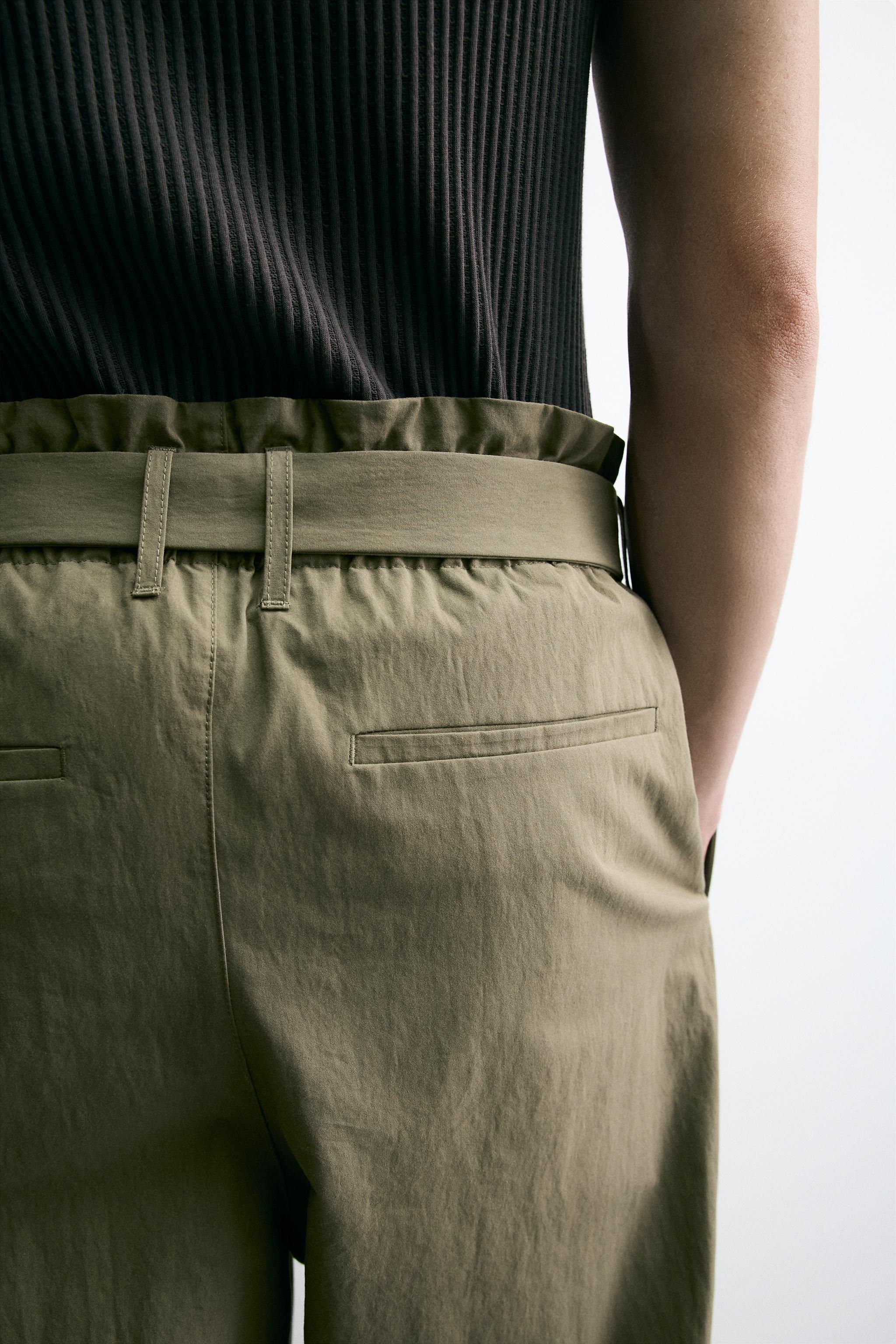 BELTED PLEATED WIDE FIT PANTS
