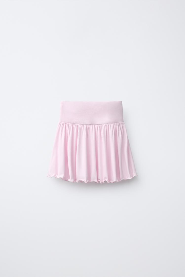 FALDA CON VOLANTES Y TACHAS 3