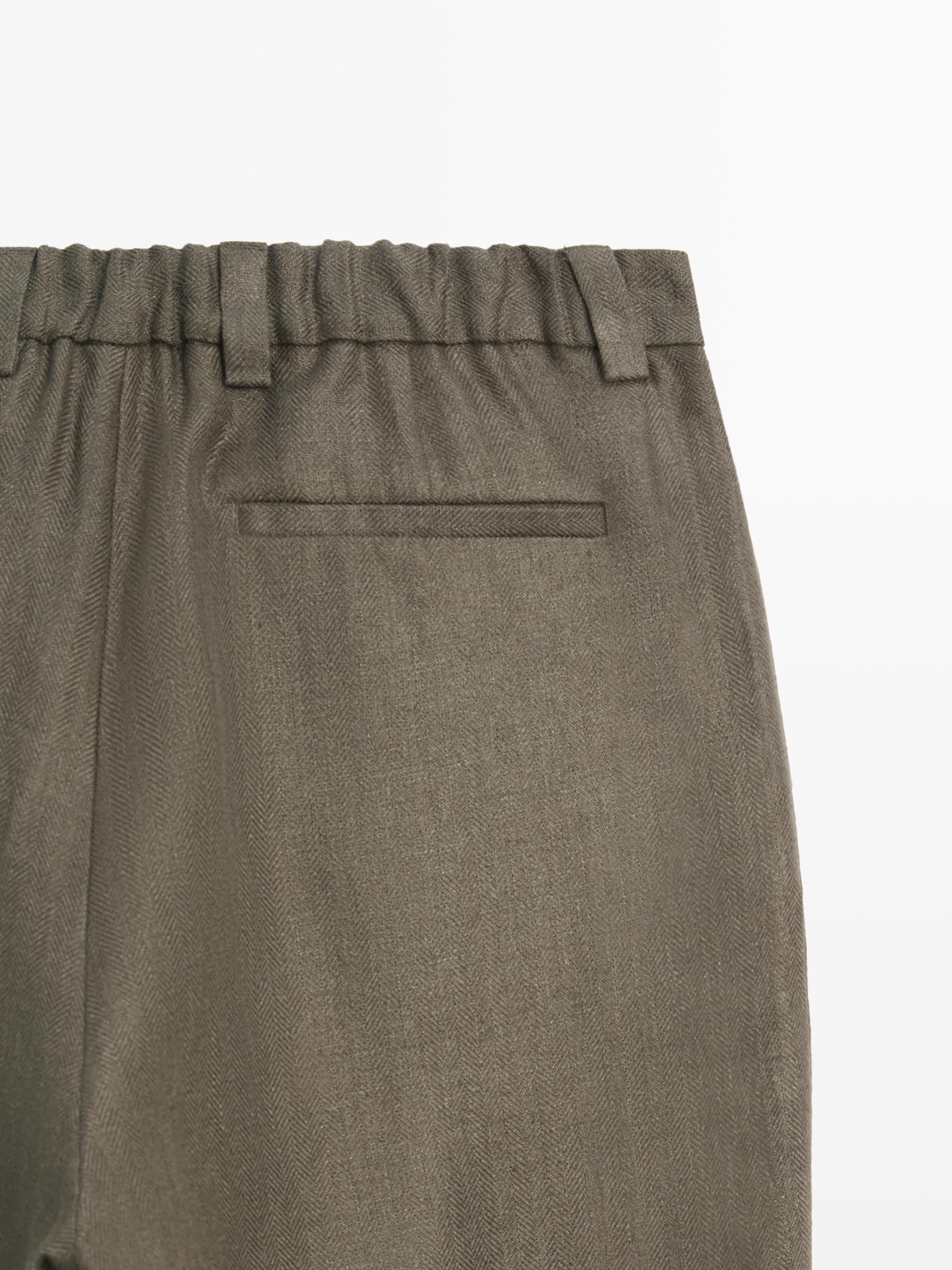 Linen trousers with herringbone detail