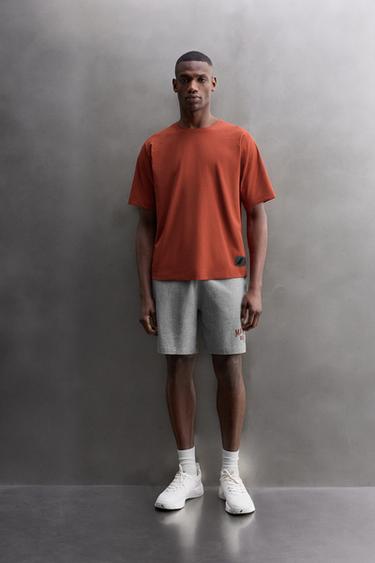 CAMISETA TÉCNICA PARCHE - Burgundy de Zara - Imagen 0