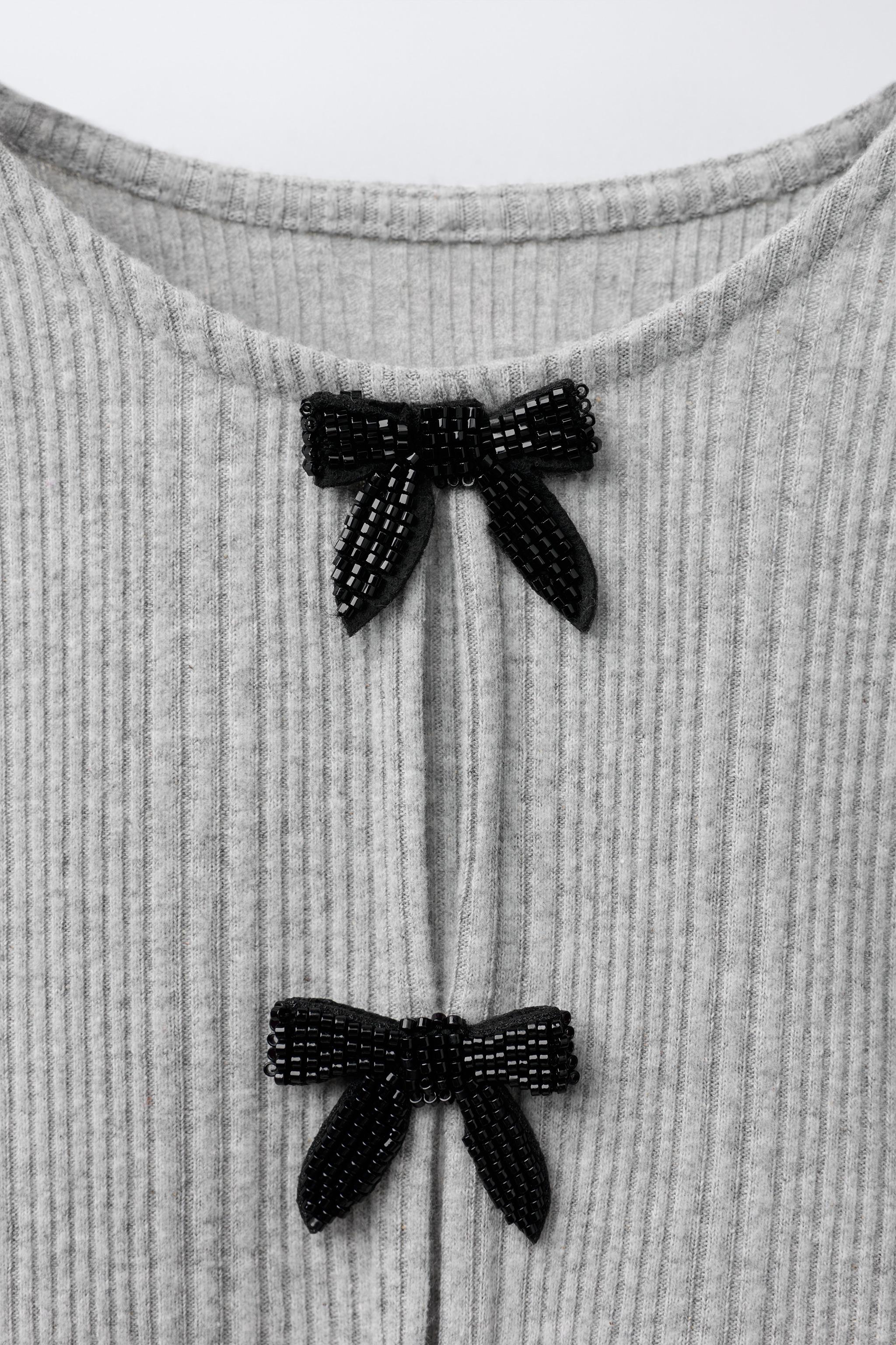 HAUT CÔTELÉ SOFT TOUCH À LACETS