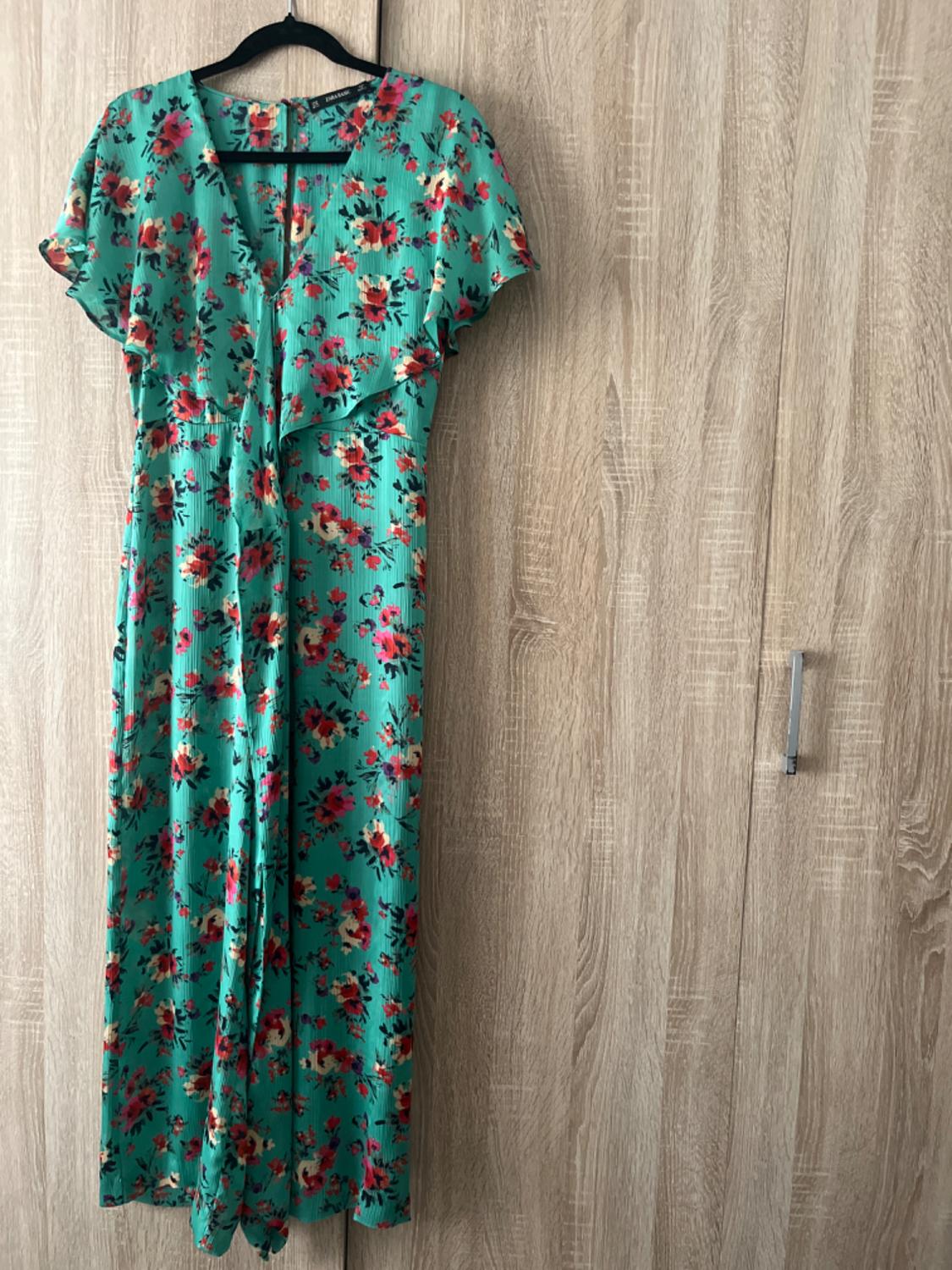 FLORAL PRINT WRAP JUMPSUIT