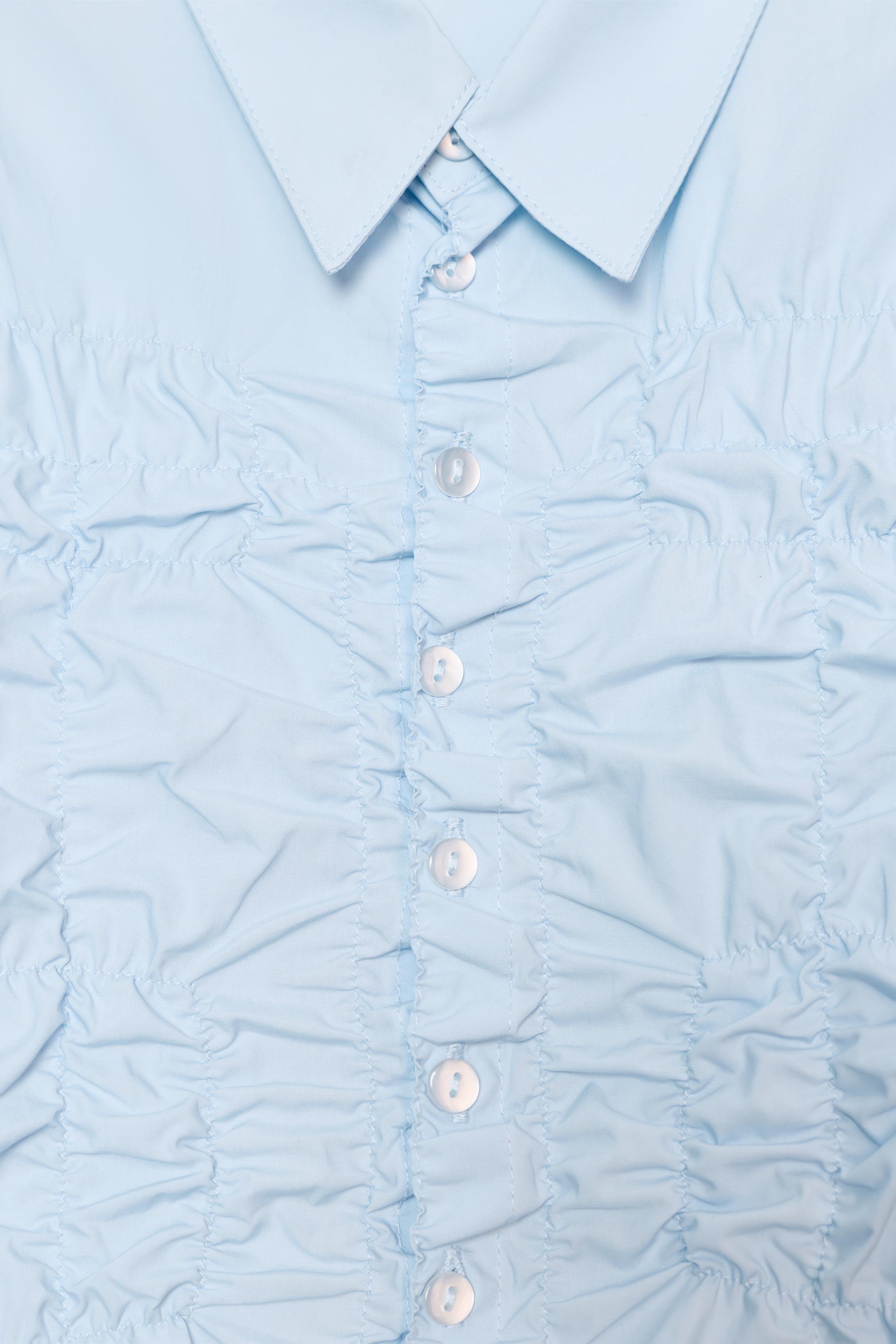 CHEMISE EN POPELINE À PLIS ÉLASTIQUES