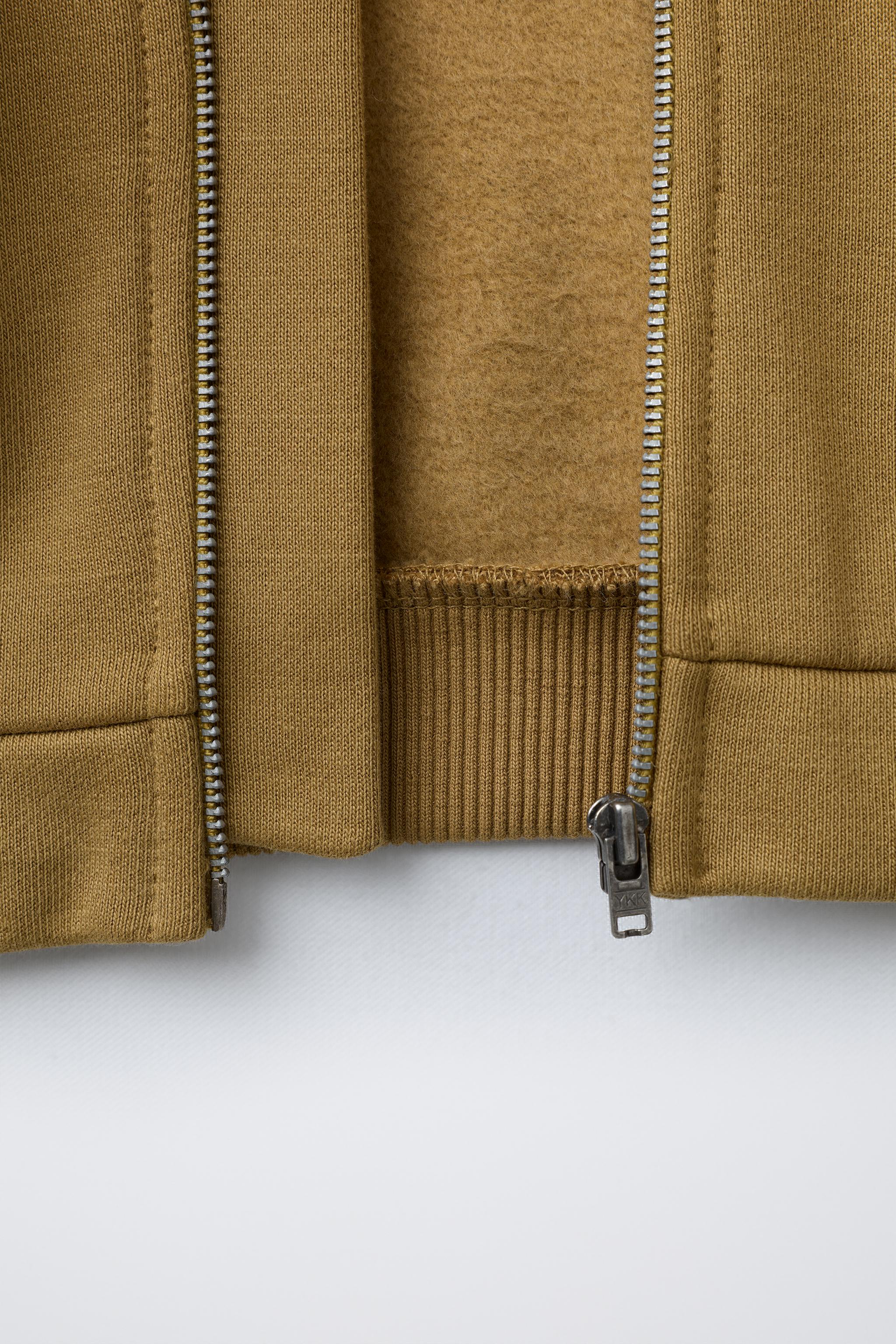 EMBOSSED LOGO ZIP-UP HOODIE