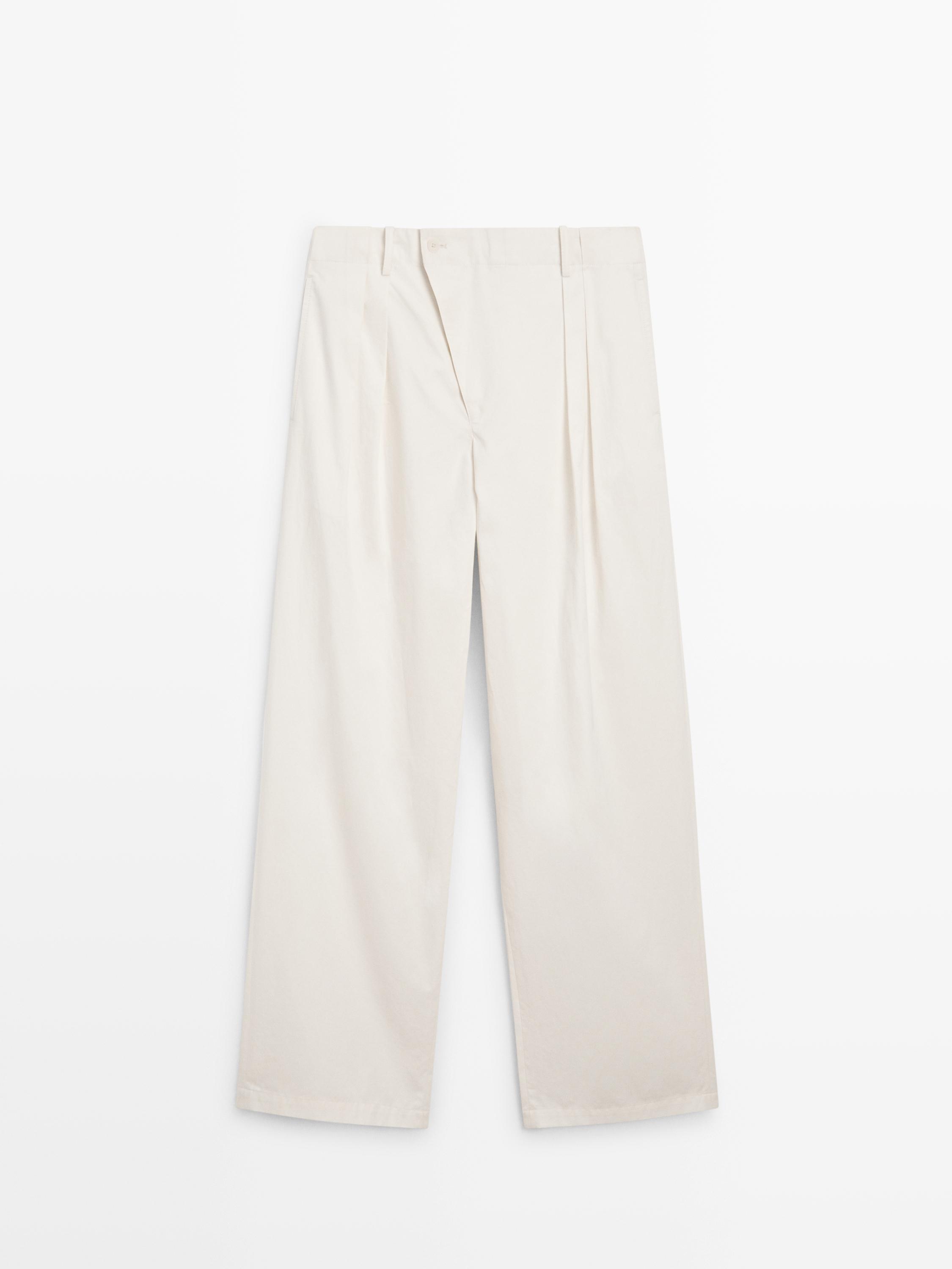 Pleated trousers with crossover fastening - STUDIO
