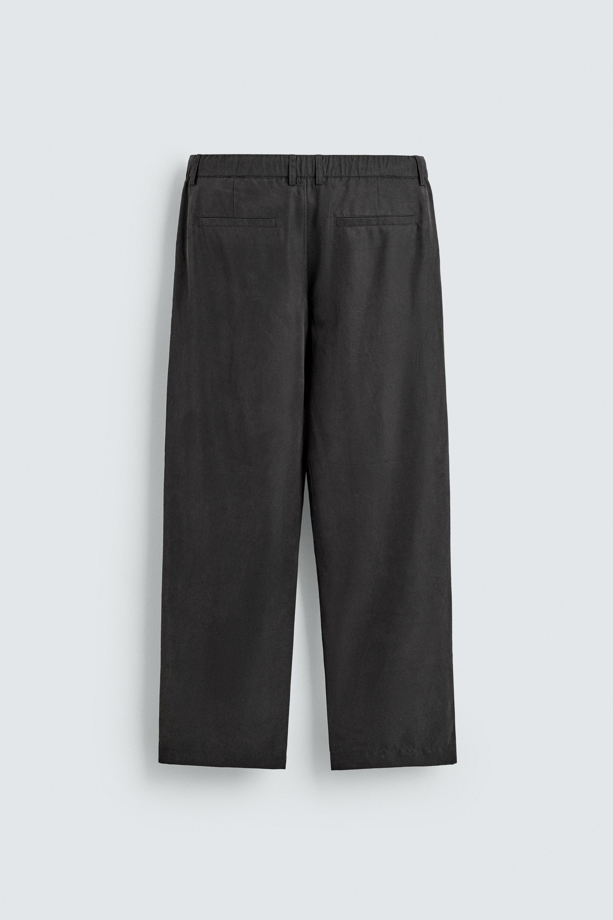 RELAXED FIT FLOWY PANTS