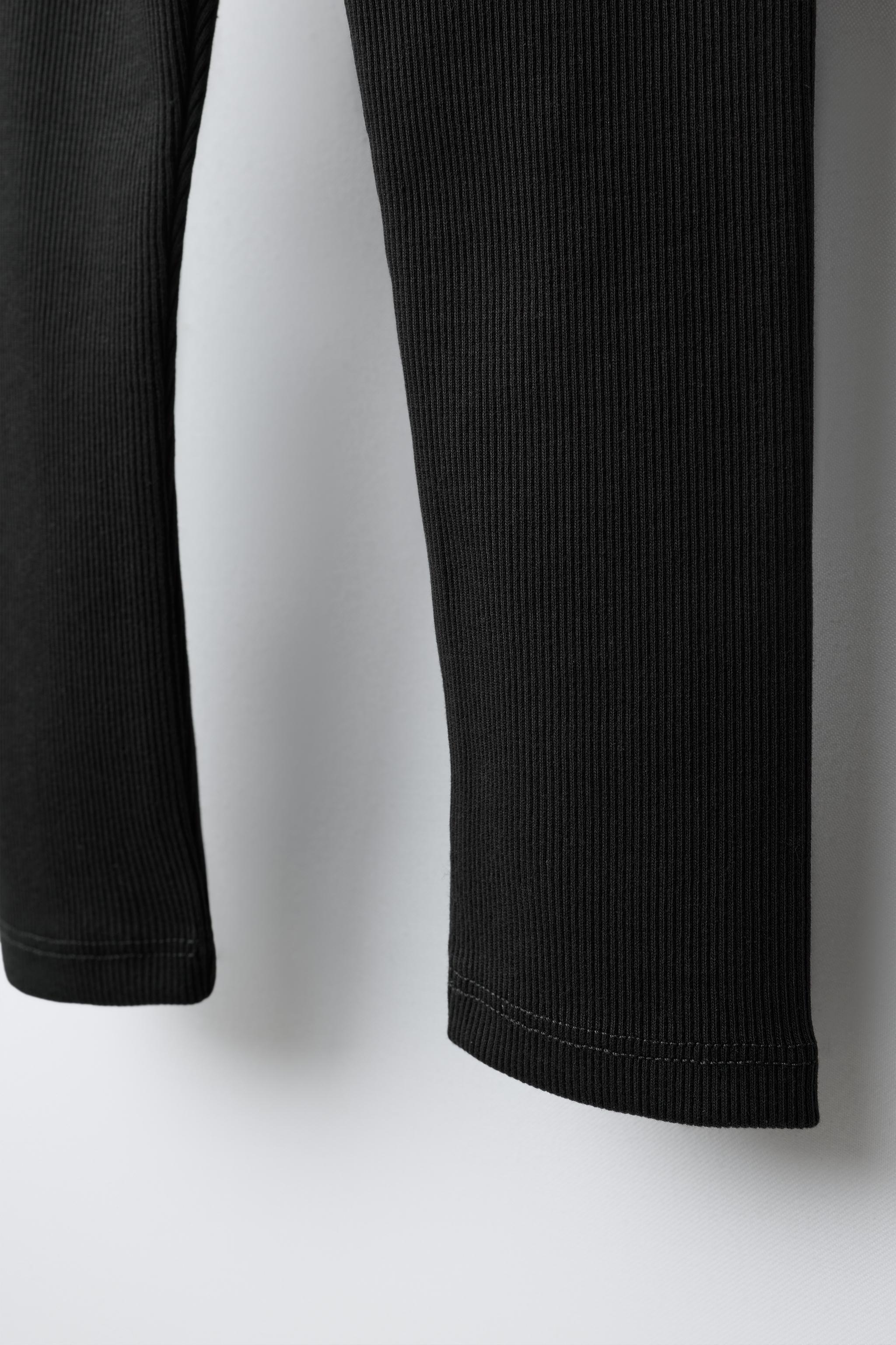 LABEL DETAIL RIBBED LEGGINGS — Black