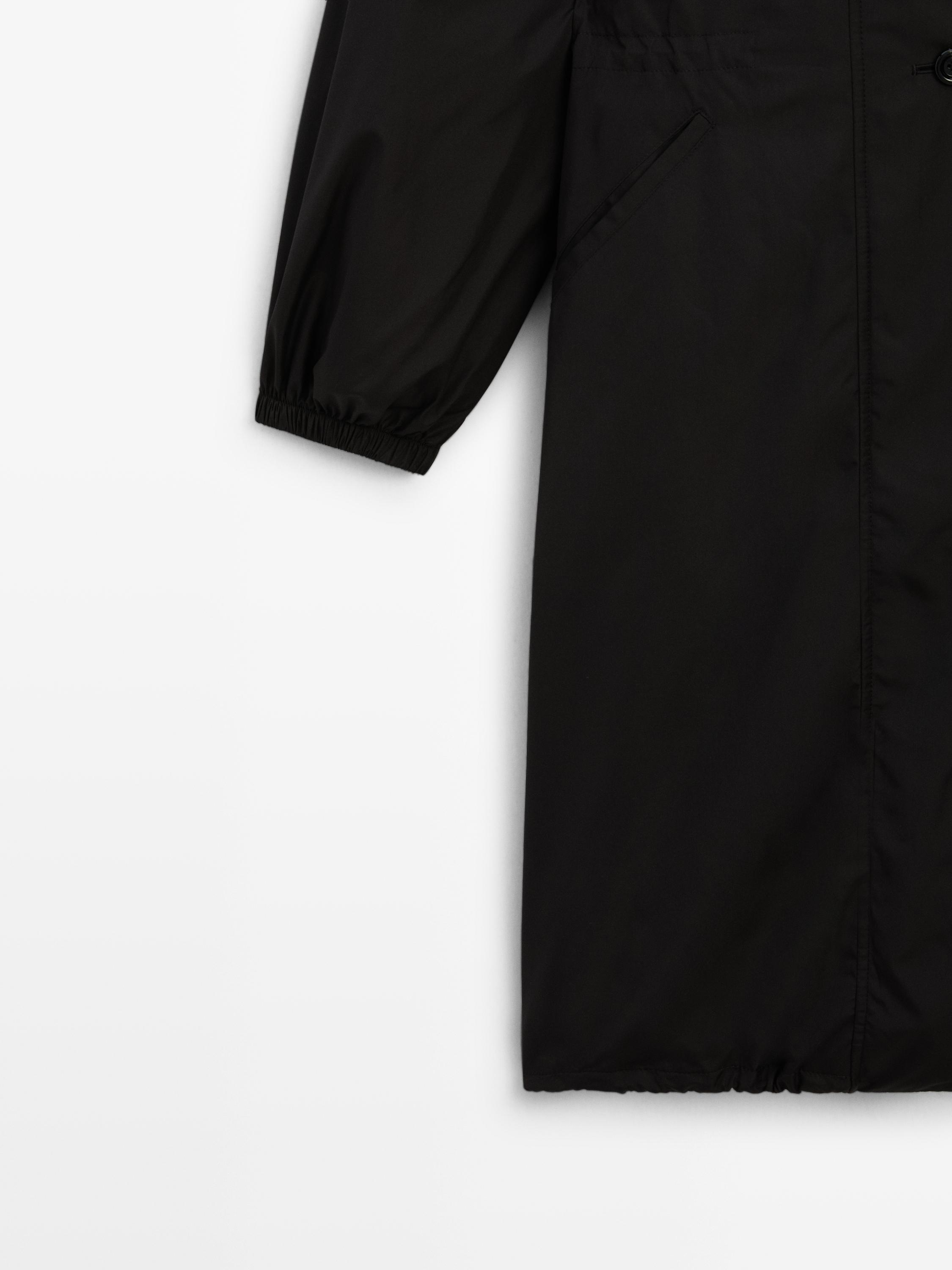 Water-repellent parka with detachable inner gilet
