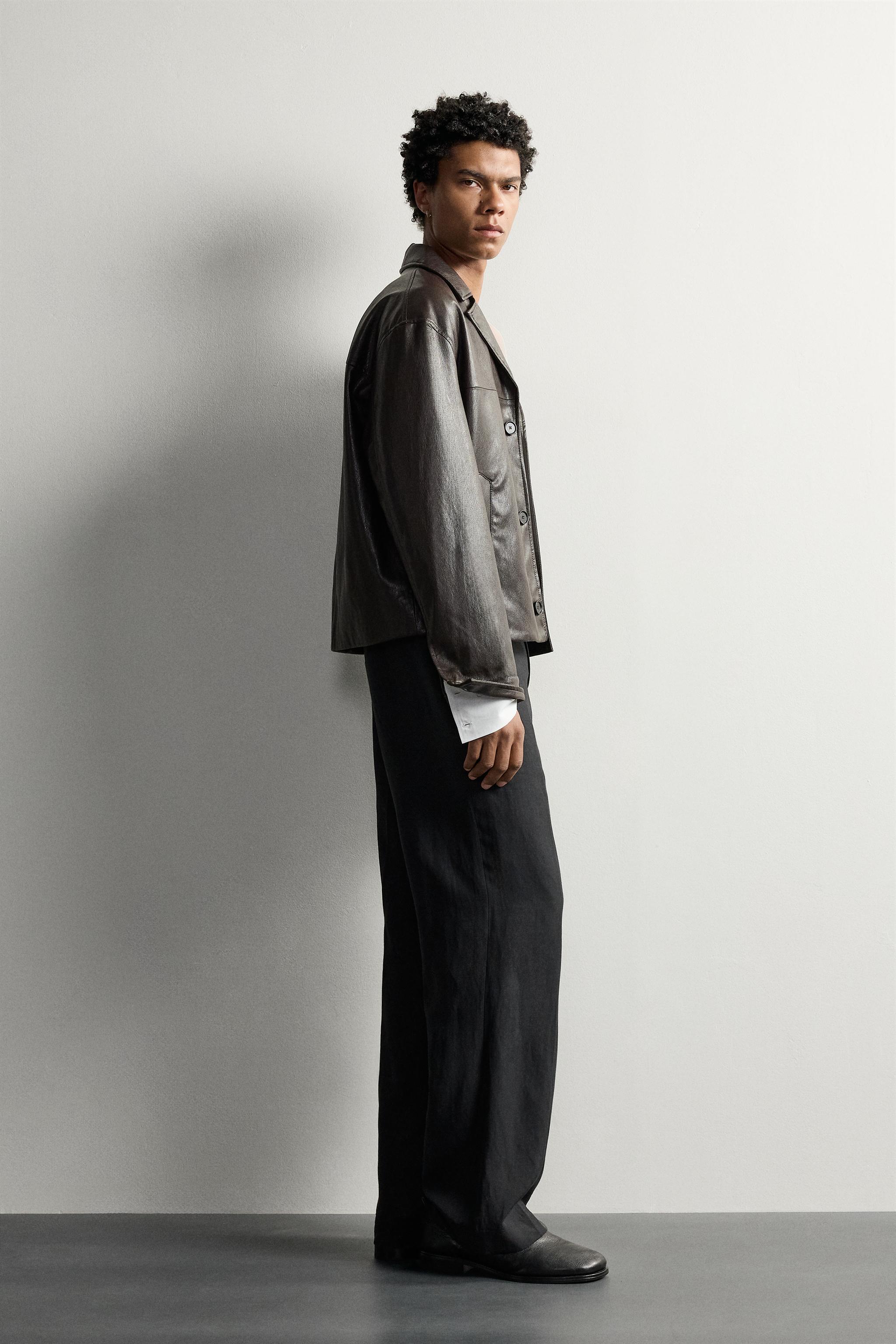 BLOUSON COURT EN MATIÈRE SYNTHÉTIQUE