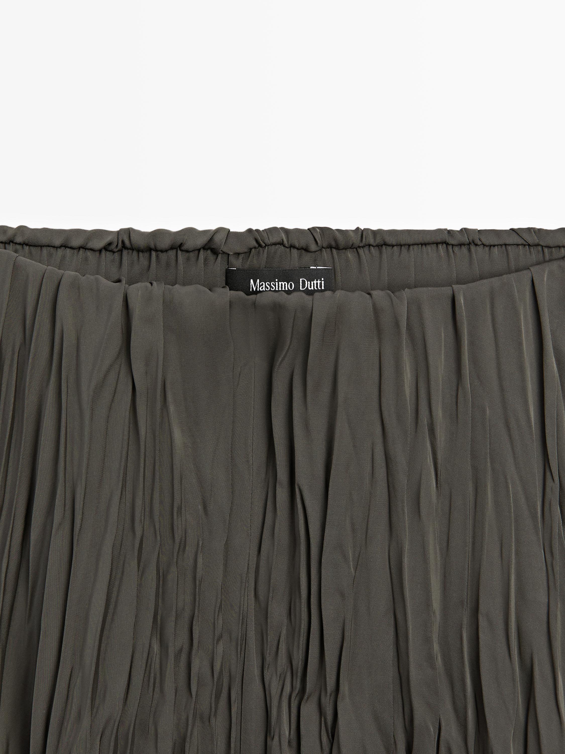 Long flowing pleated skirt