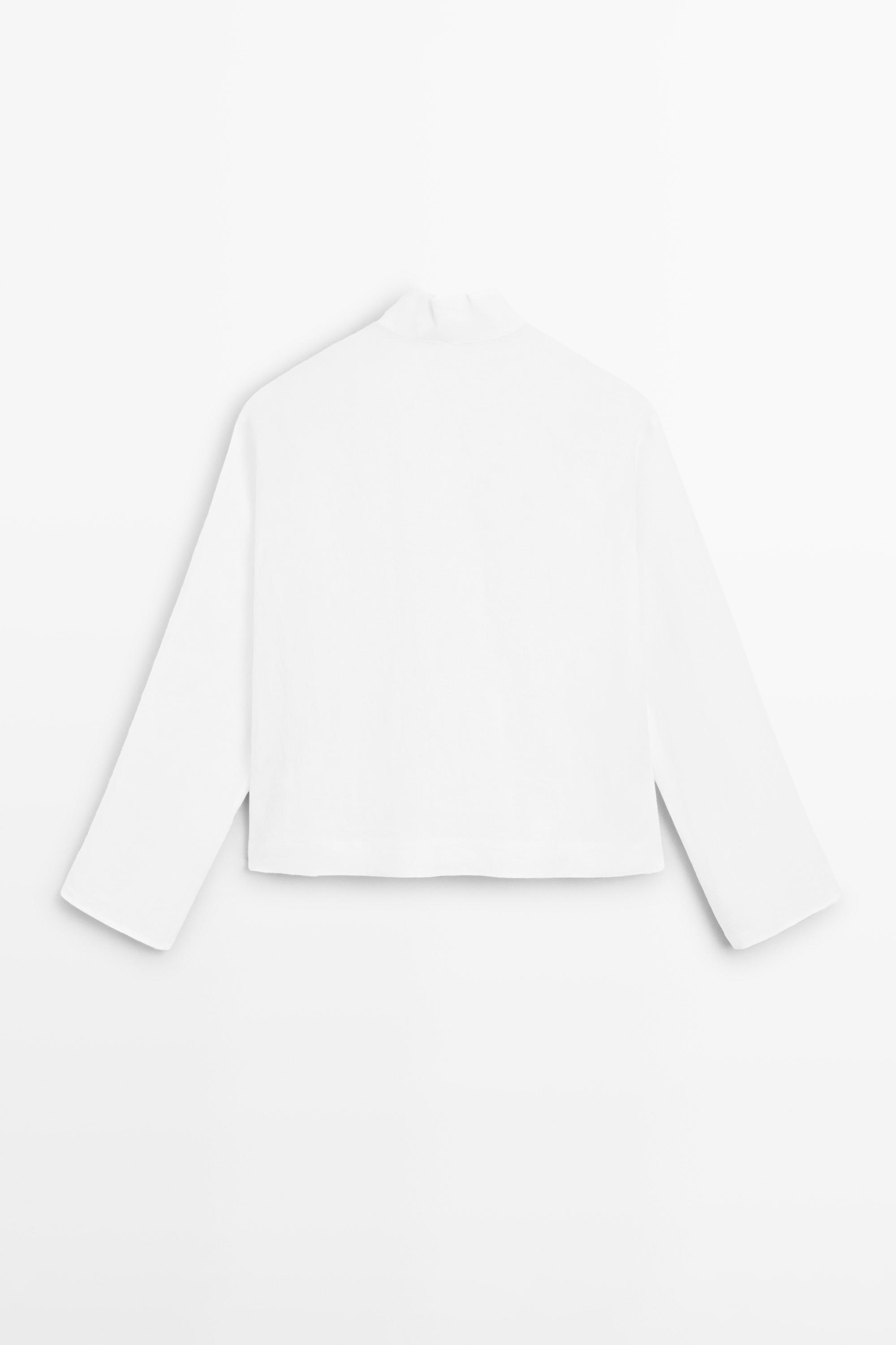Flowing linen blouse with surplice neckline