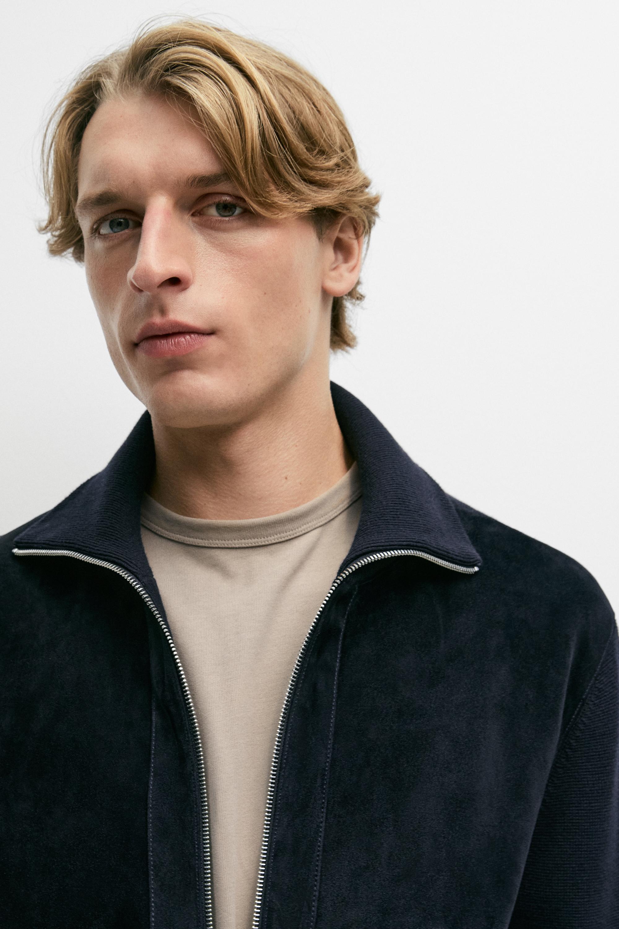 Veste en tissu combiné cuir et daim
