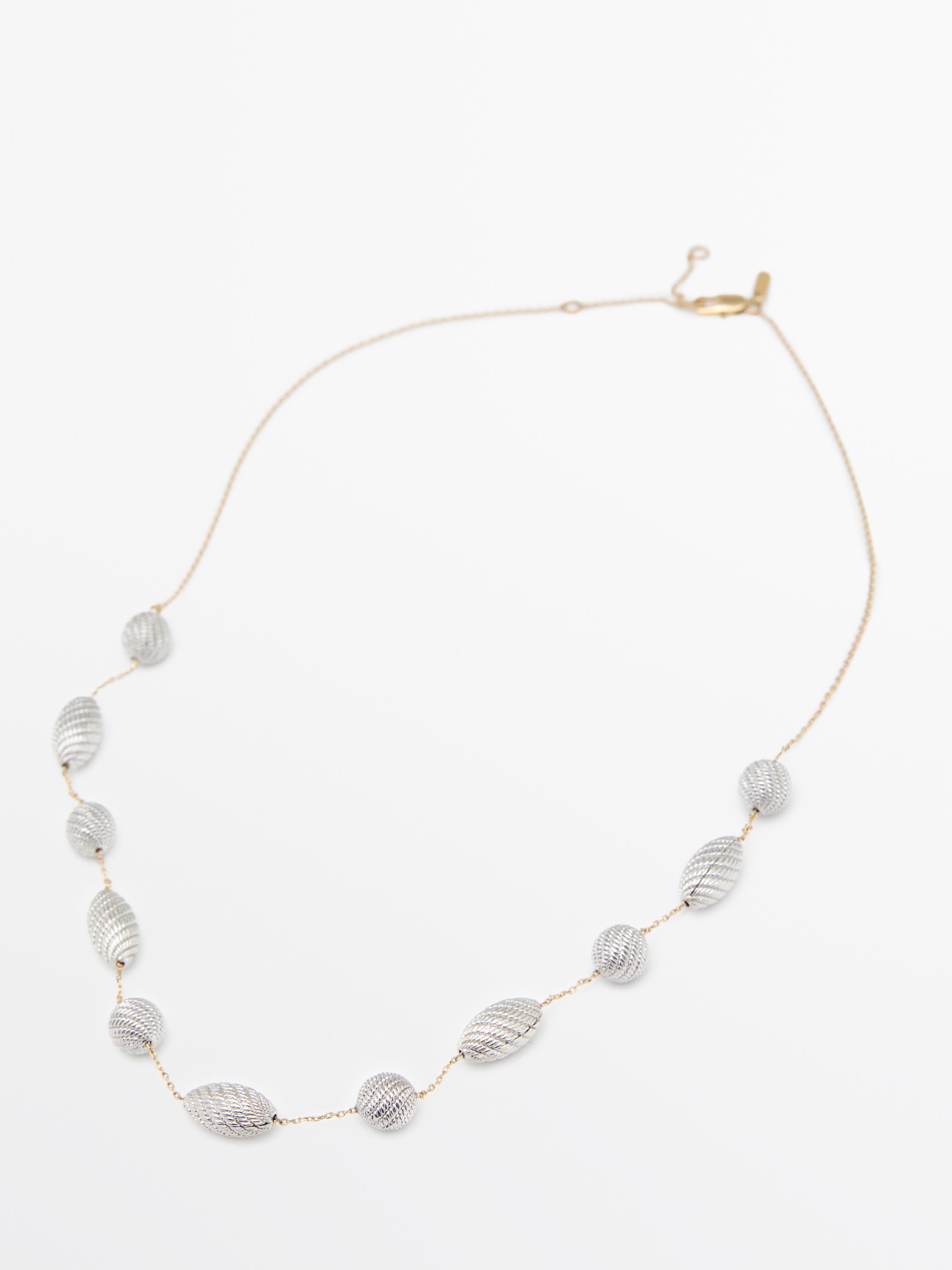 Collier texturé pièces ovales
