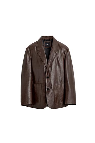 Front view of a brown blazer with lapels, two-button closure, and patch pockets at the hip.