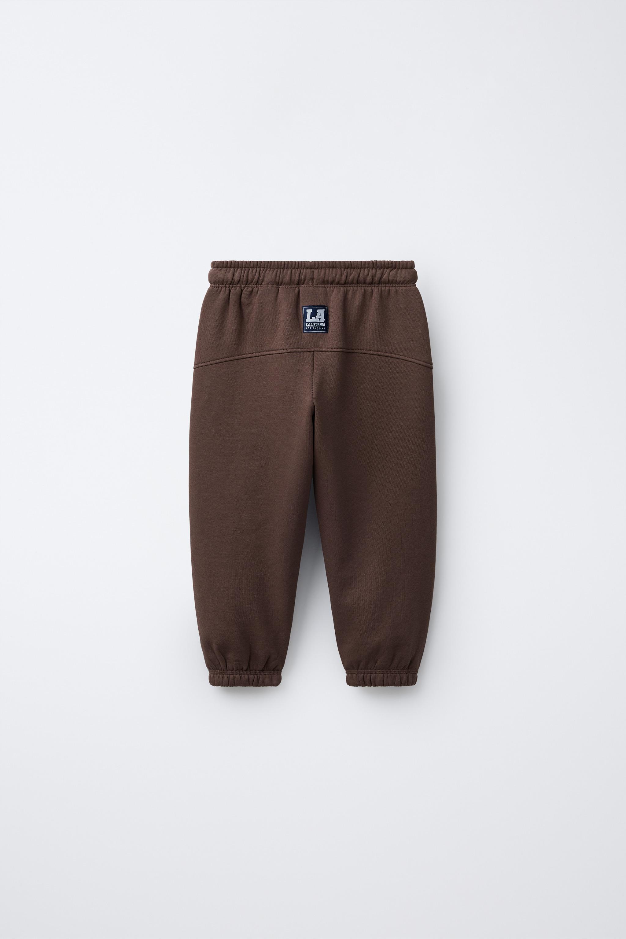 PANTALON DE JOGGING BRODÉ AVEC NUMÉRO ANIMAL