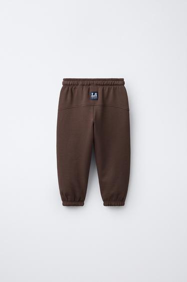 EMBROIDERED ANIMAL NUMBER JOGGERS - Brown by Zara - Image 1