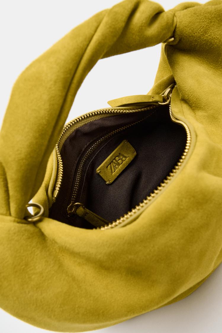 Bolso de mano de cuero fruncido 6