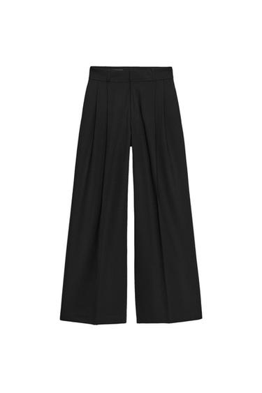 PANTALÓN RAYA DIPLOMÁTICA PINZAS TAPETAS - Negro de Zara