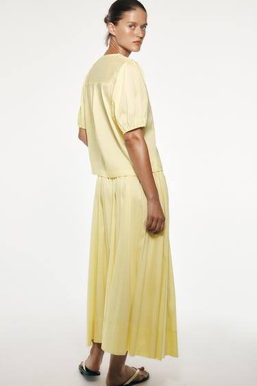 FALDA MIDI BOLSILLOS - Amarillo de Zara