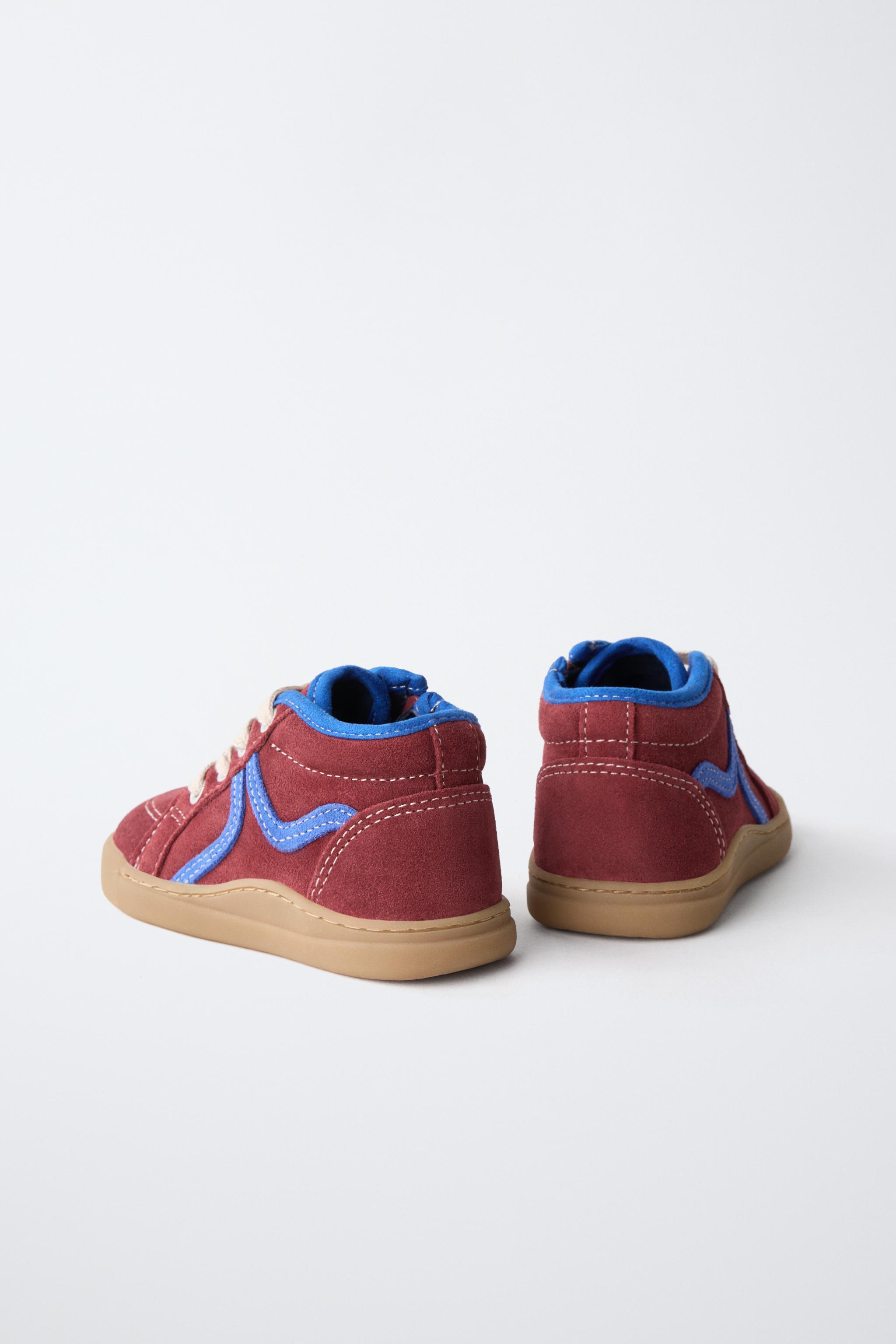 BASKETS MONTANTES EN CUIR