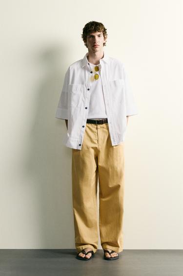 قميص مخطط بـ boxy fit - أبيض by Zara