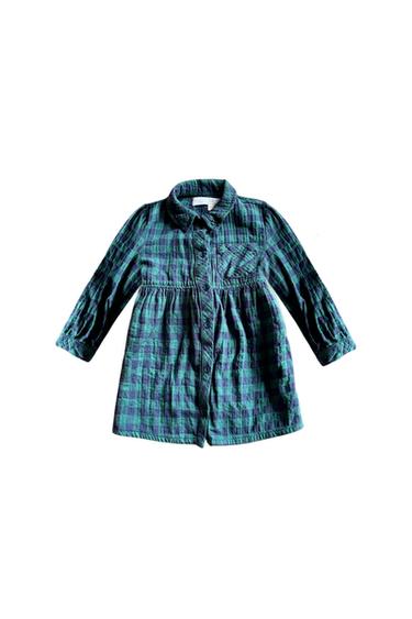 Long-sleeved dress with a check print in shades of green and blue, featuring a classic collar and front buttons.
