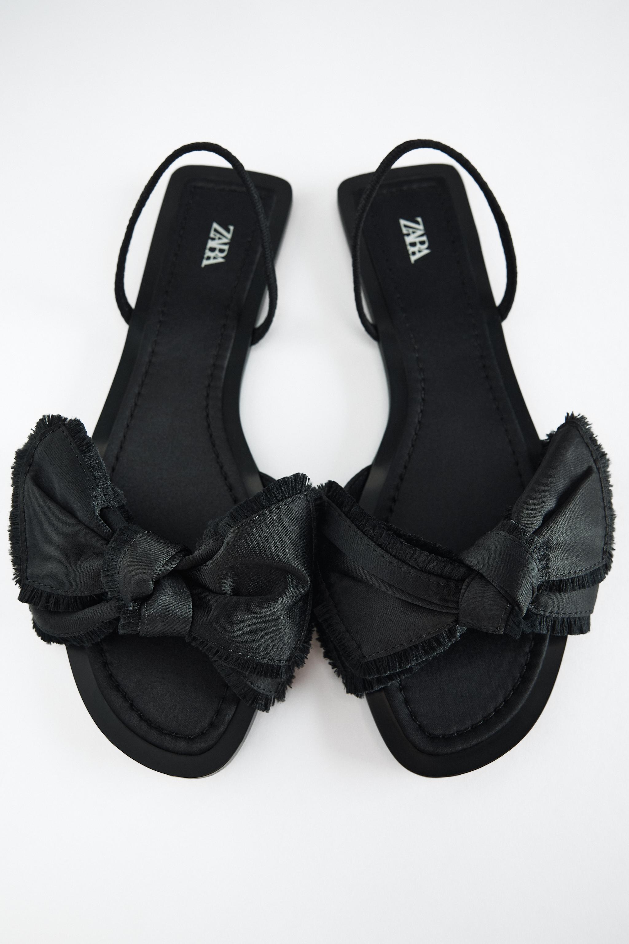 Black flat sandals with bow on sale