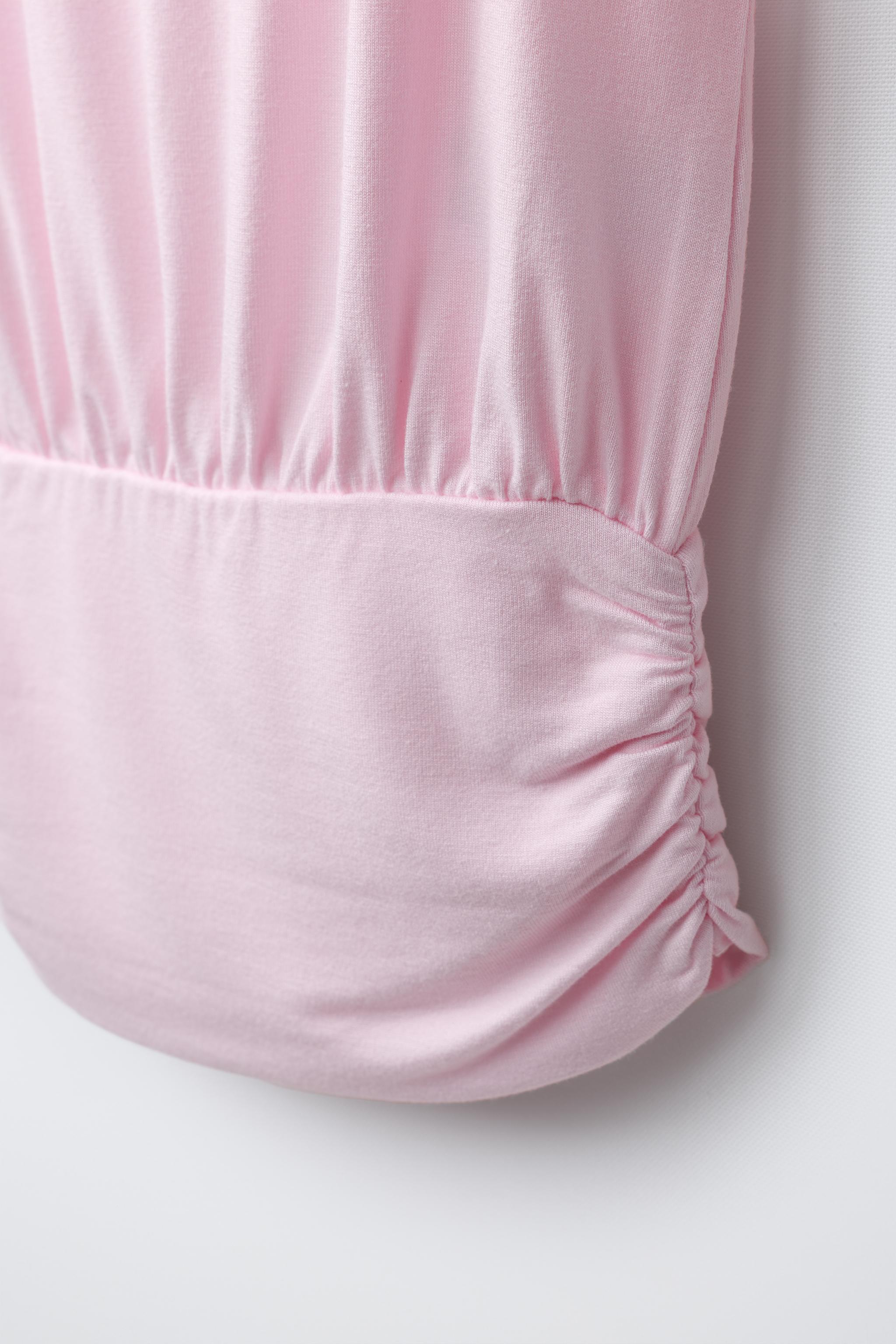 FLOWING T-SHIRT WITH WAISTBAND
