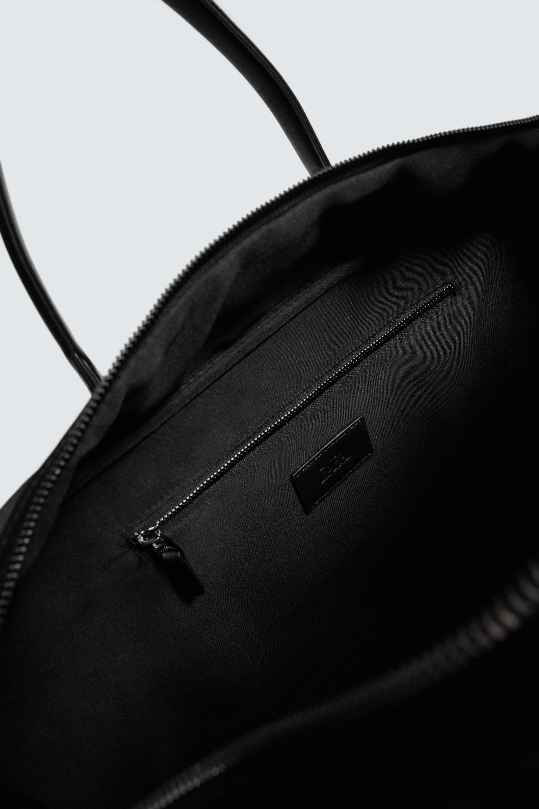 SAC DE VOYAGE EN TISSU TECHNIQUE