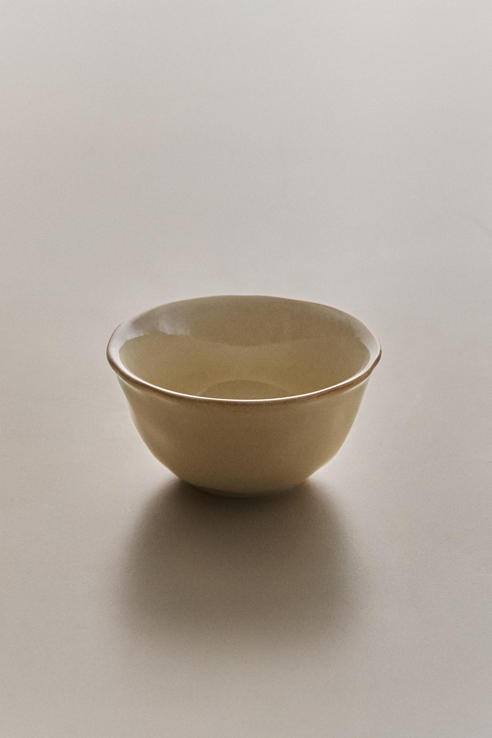 STONEWARE BOWL WITH IRREGULAR EDGE