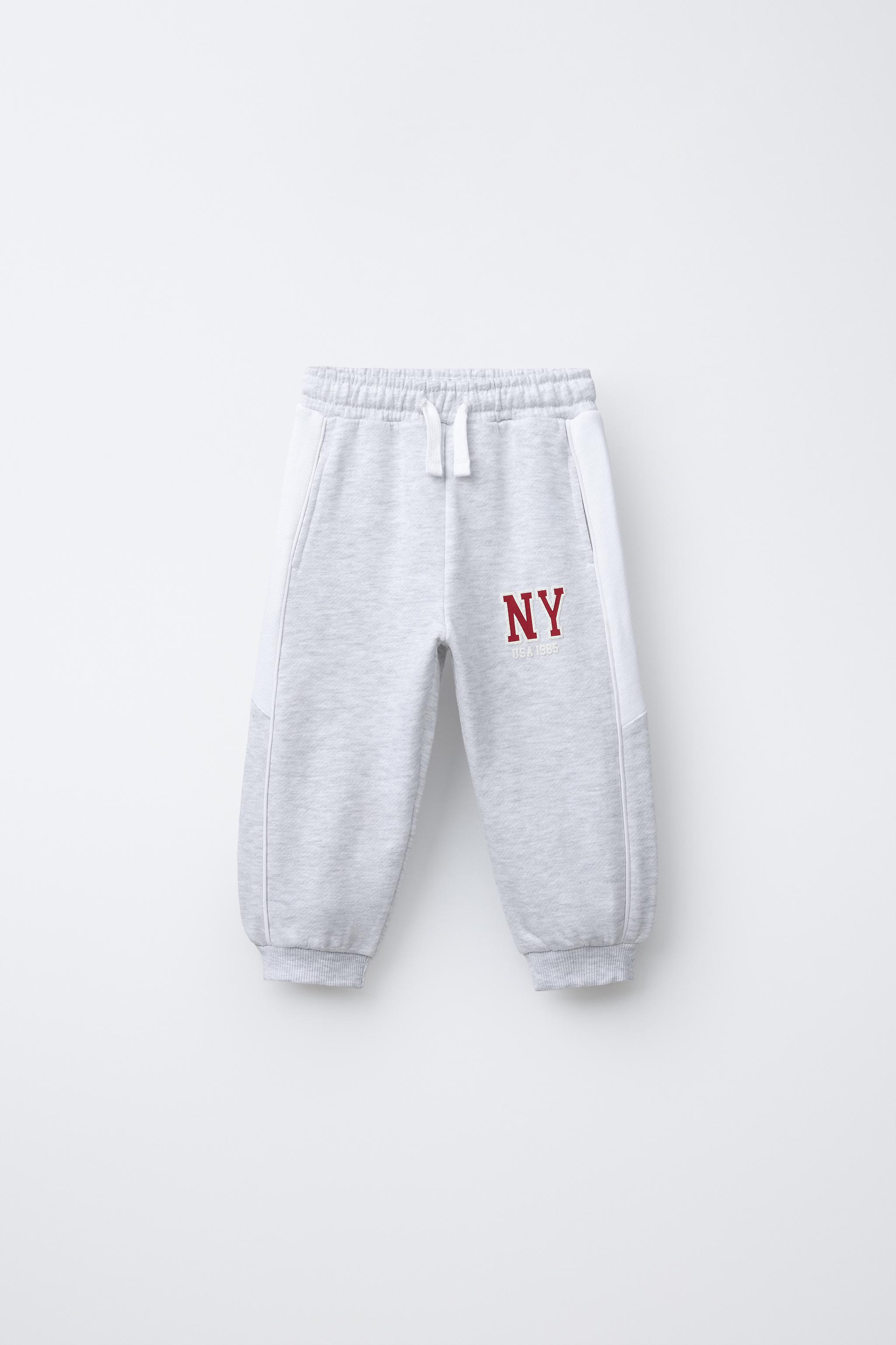 PANTALON DE JOGGING À BANDES LATÉRALES