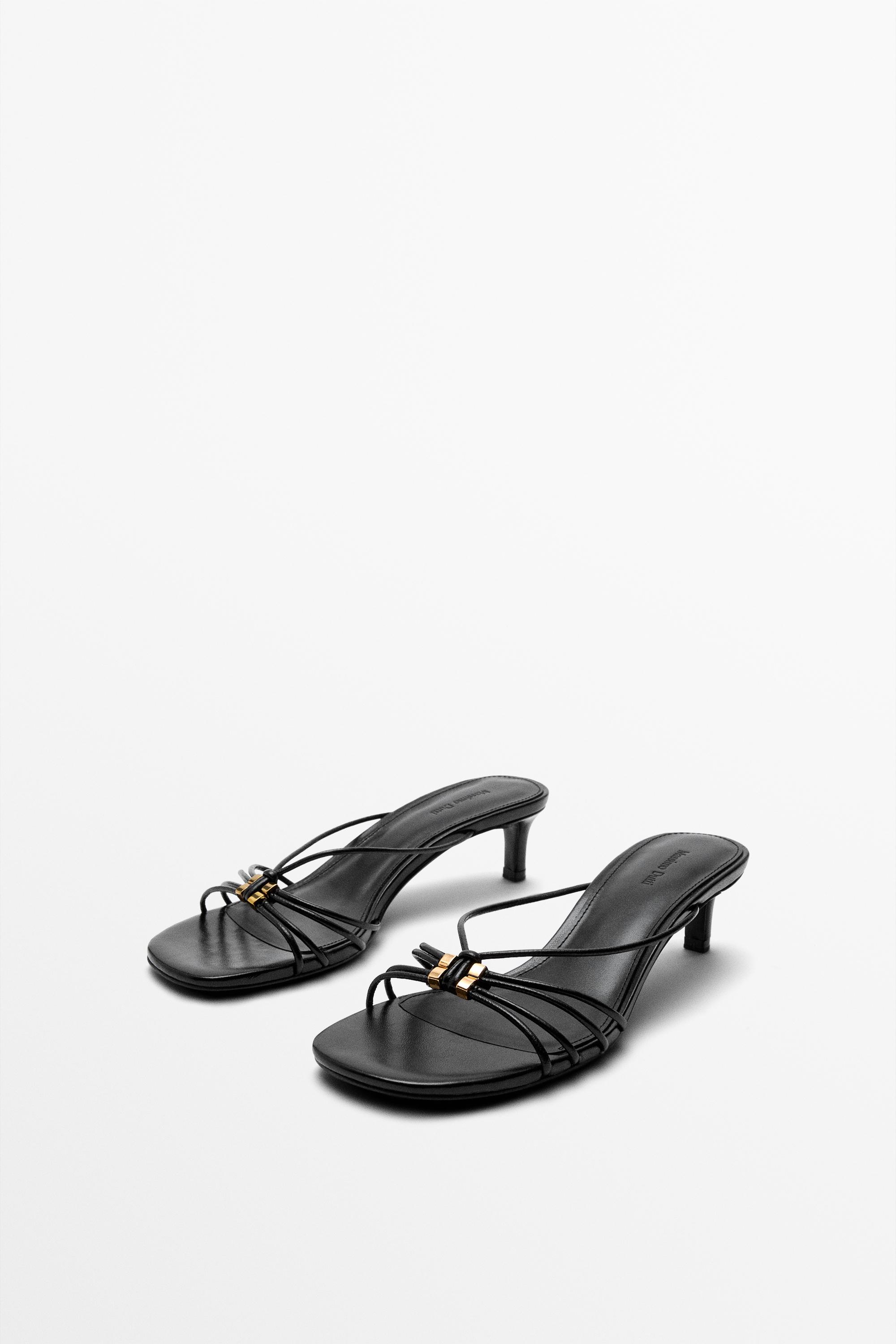 Strappy heeled sandals with embellished detail