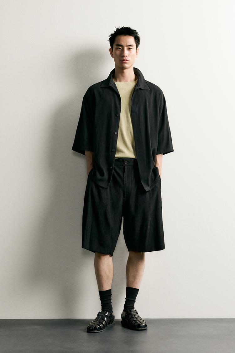 TEXTURED RELAXED FIT BERMUDA SHORTS