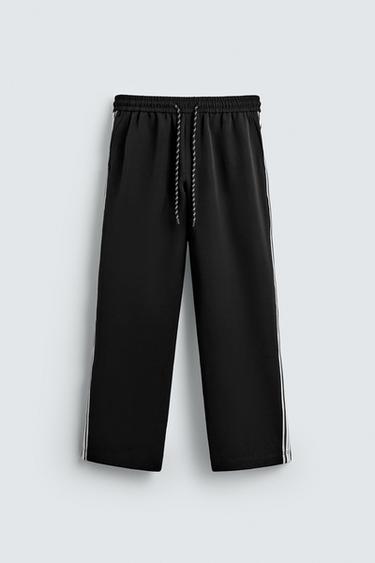 PANTALÓN JOGGER WIDE FIT BANDAS - Negro de Zara