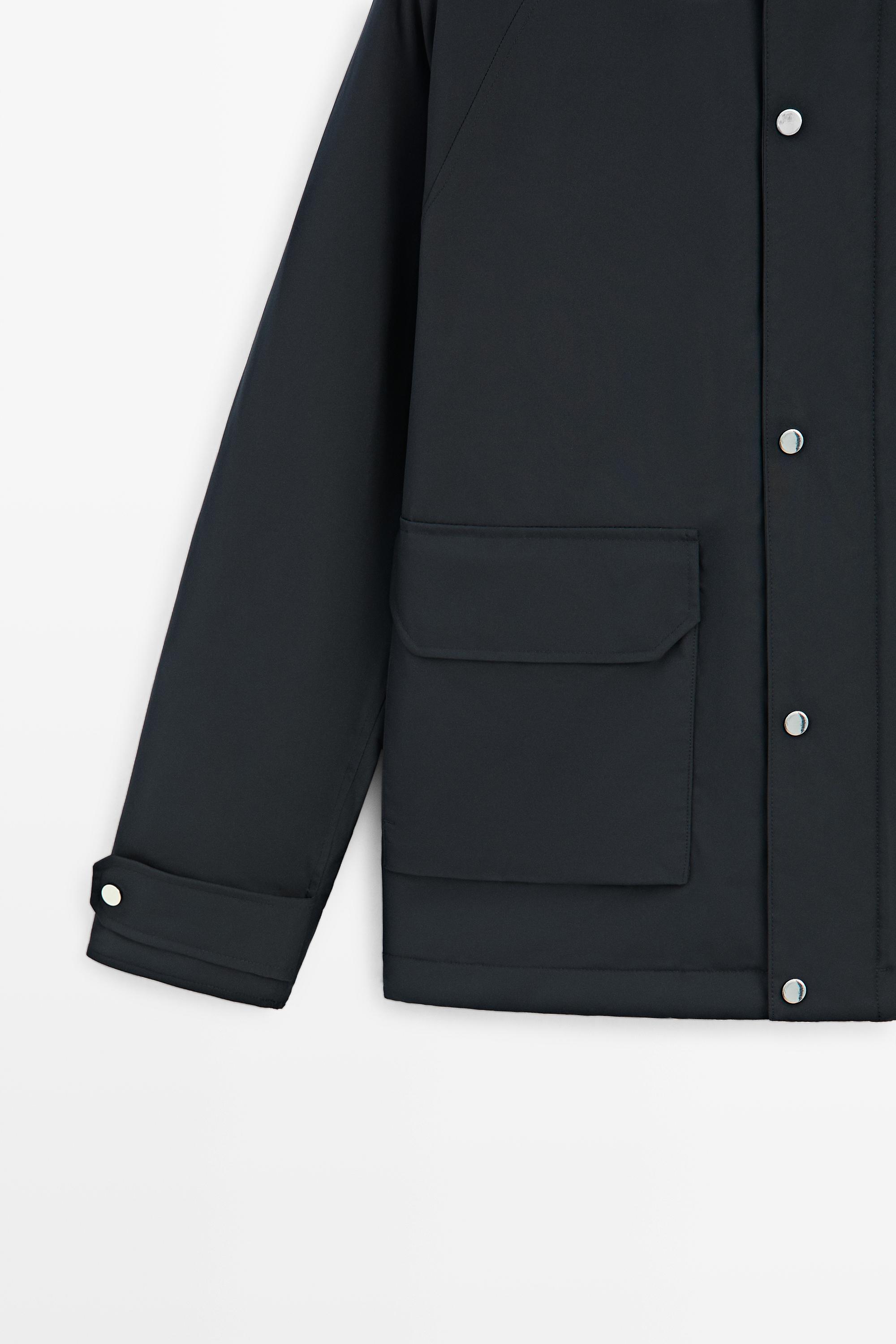 Short quilted parka with pocket details