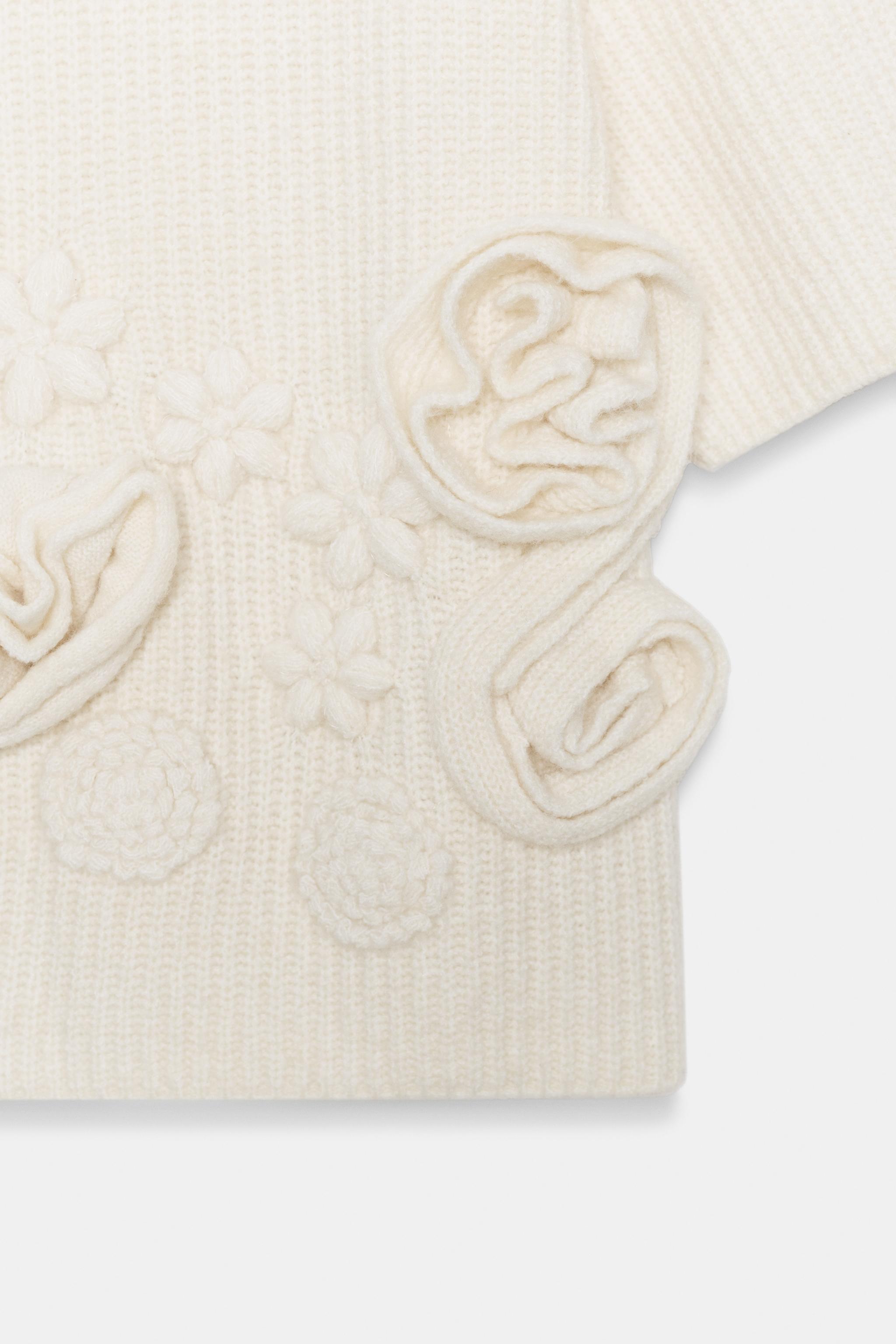 PULL EN MAILLE STRUCTURÉE FLEURS