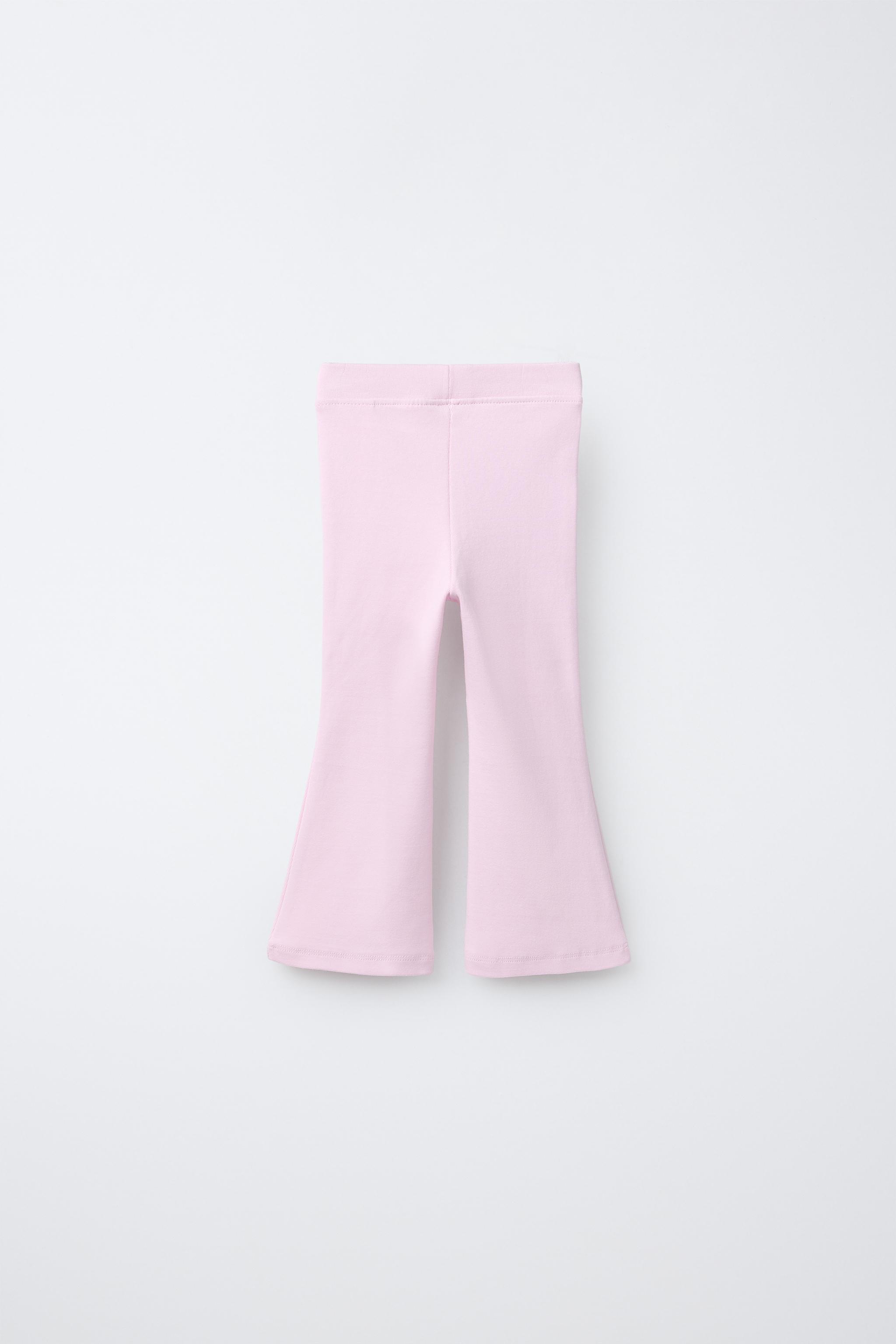 LEGGING FLARE INTERLOCK DÉCOR ÉTIQUETTE