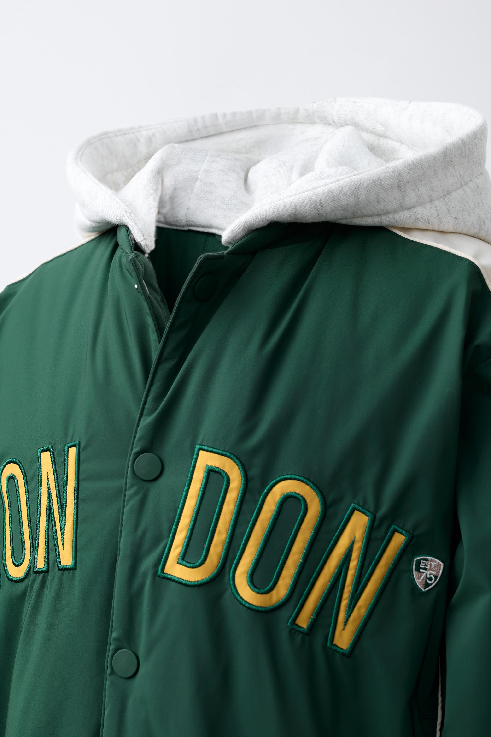 BLOUSON BOMBER CAPUCHE EN MOLLETON AMOVIBLE DÉPERLANT