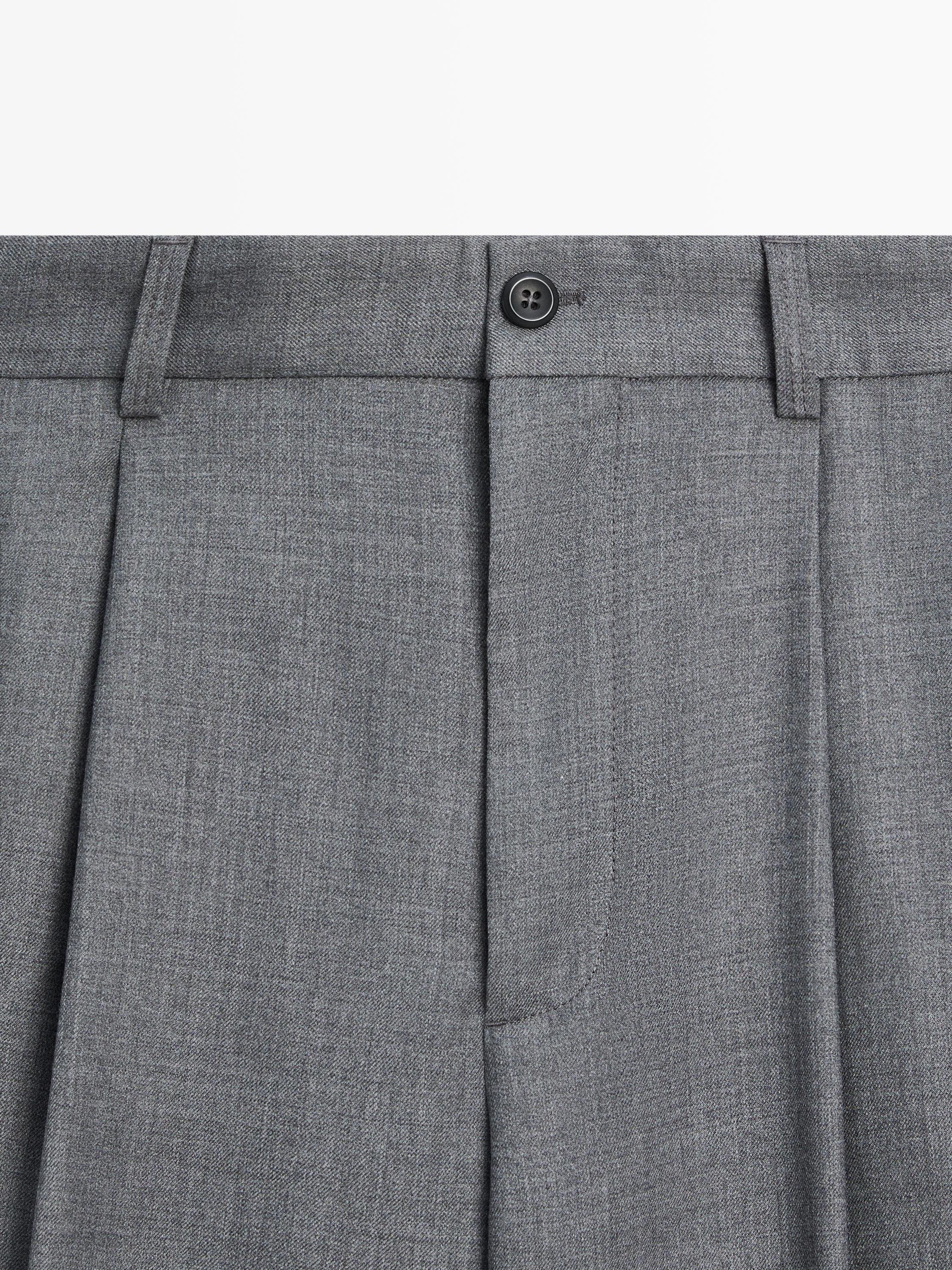 Pantalon relaxed fit à pinces en laine froide