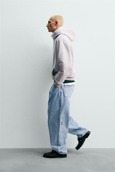 LOOSE TAPERED FIT JEANS CHAMPION® X ZARA - Light blue by Zara