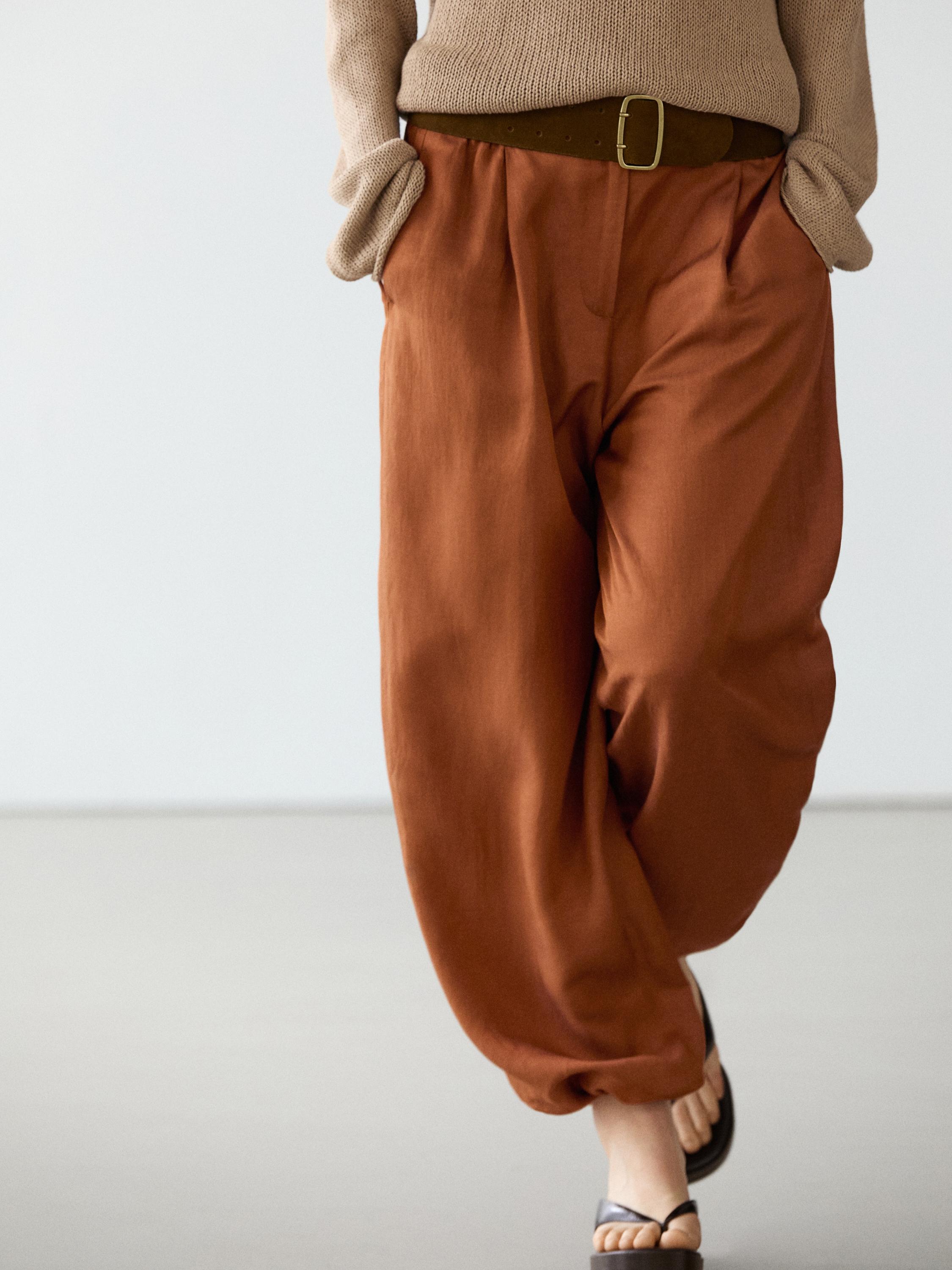 Flowing trousers with tie detail