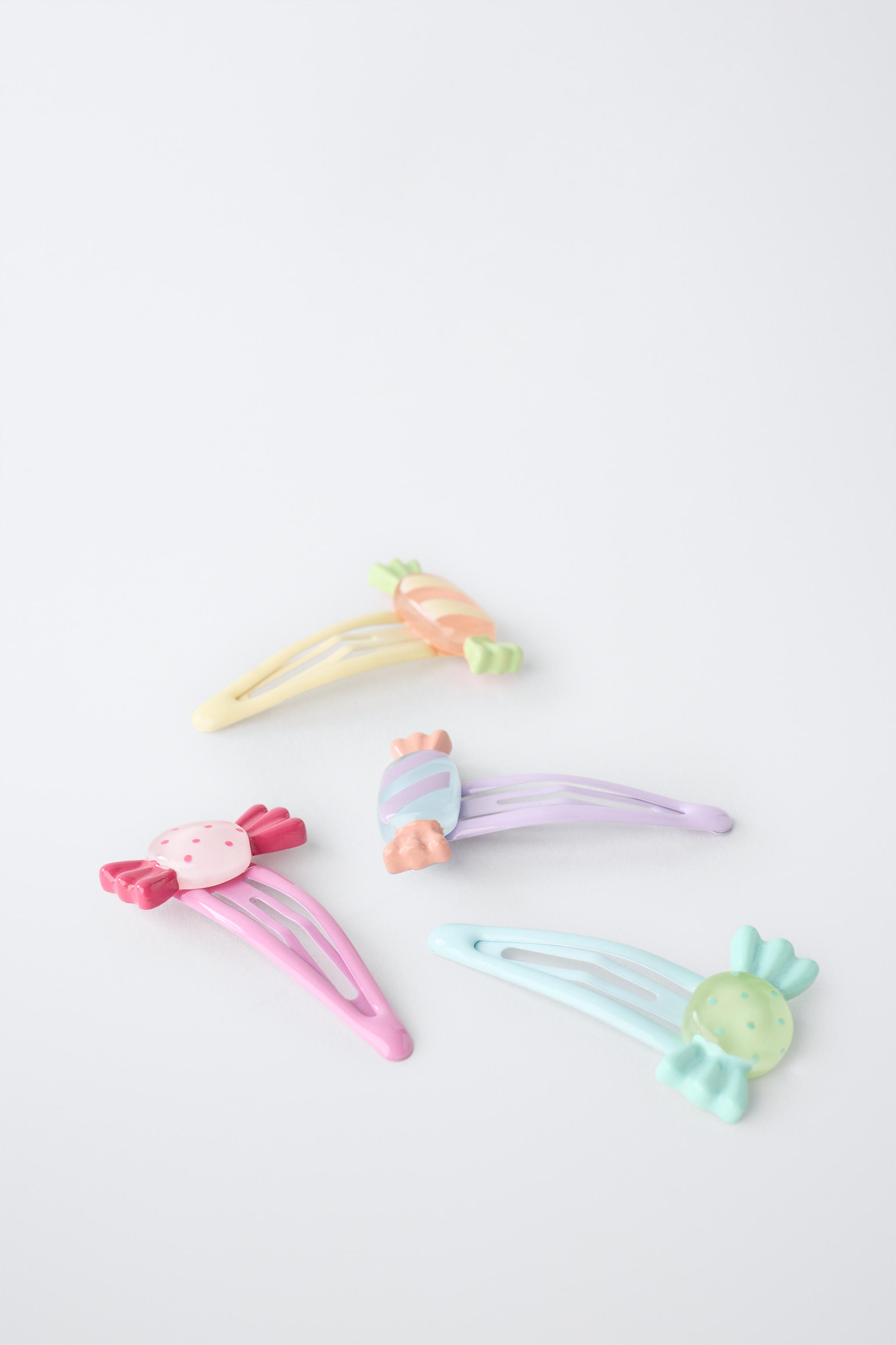 PACK OF FOUR CANDY HAIR CLIPS — Multicolored