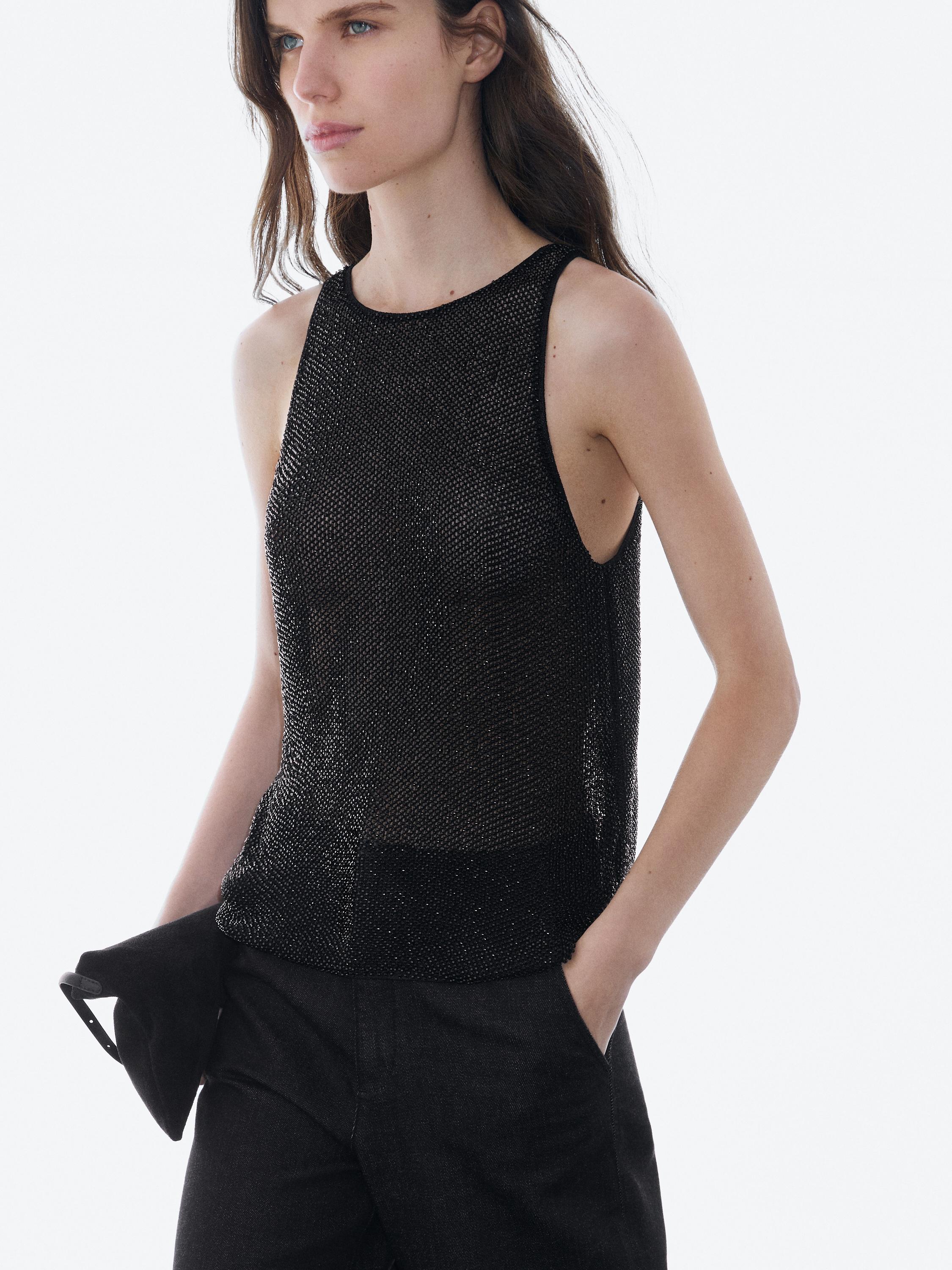 Semi-sheer top with matching beads