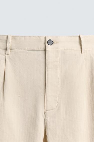 PANTALON PLIS CHEVRONS - Écru de Zara - Image 8