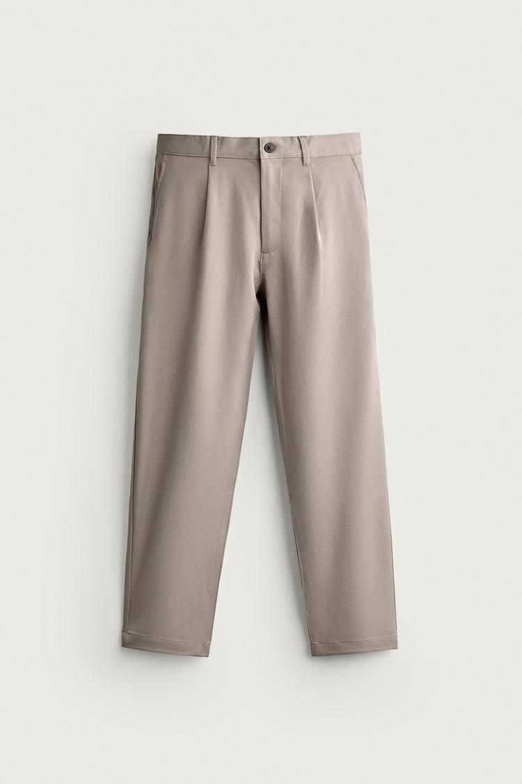 RELAXED FIT PLEATED TROUSERS
