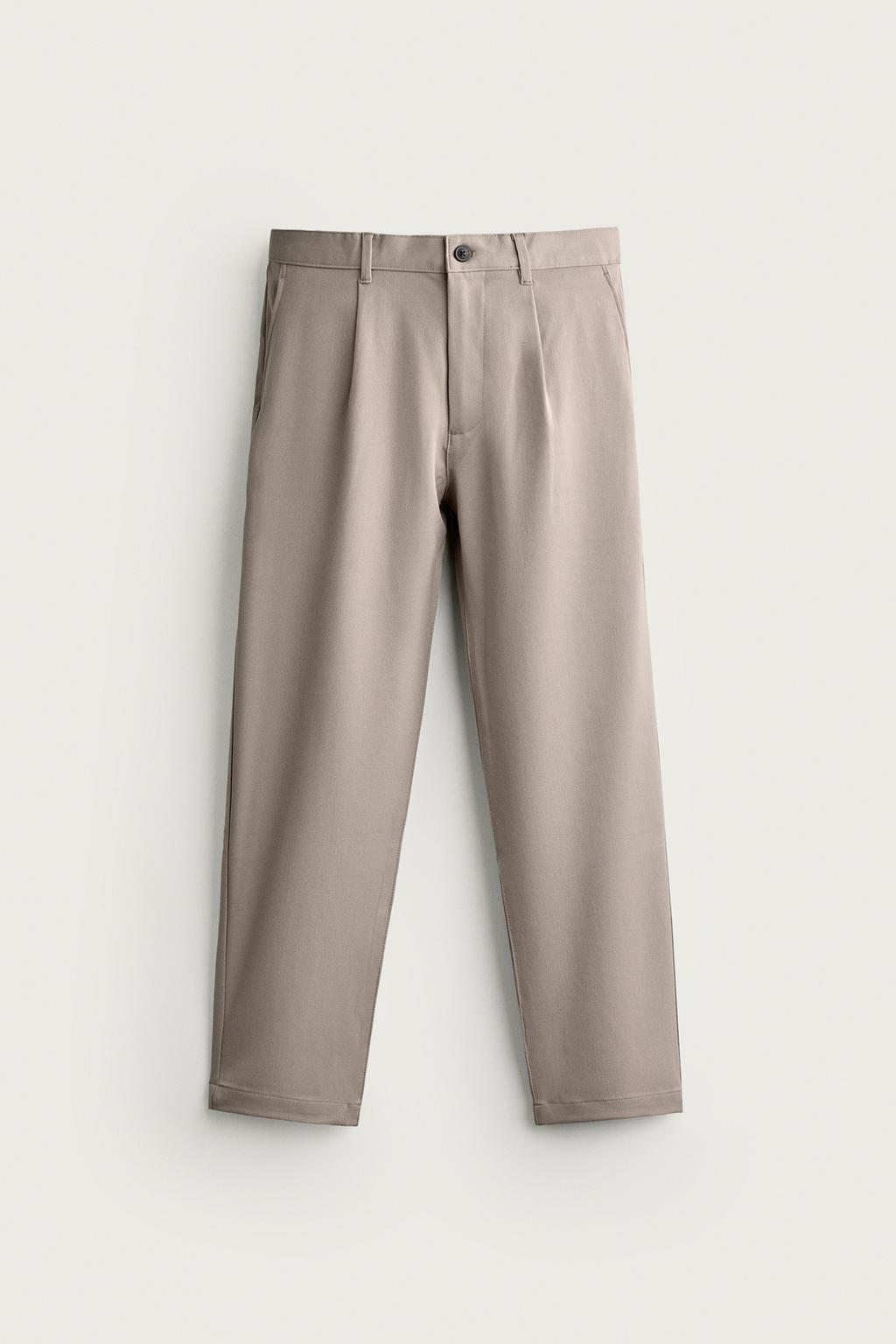 RELAXED FIT PLEATED TROUSERS