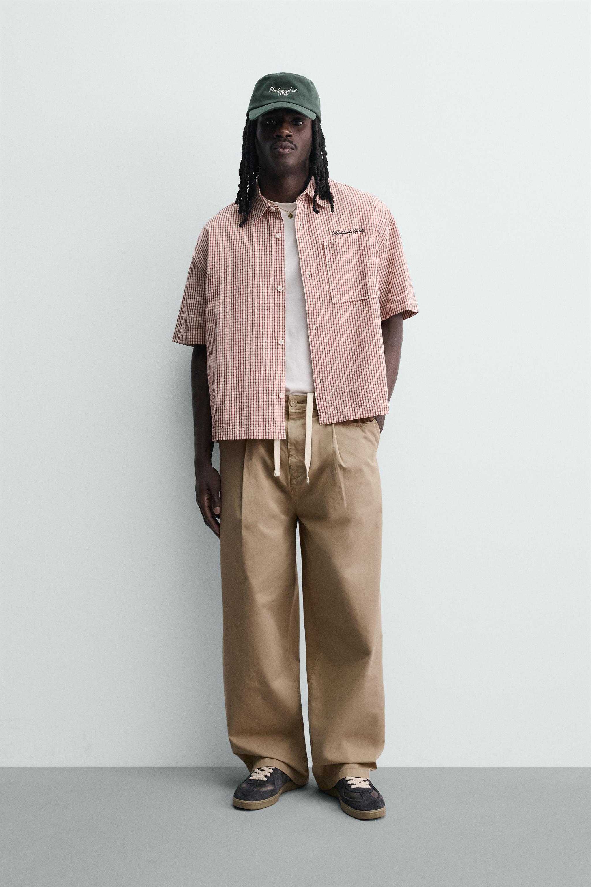 PANTALON CHINO LARGE À PLIS