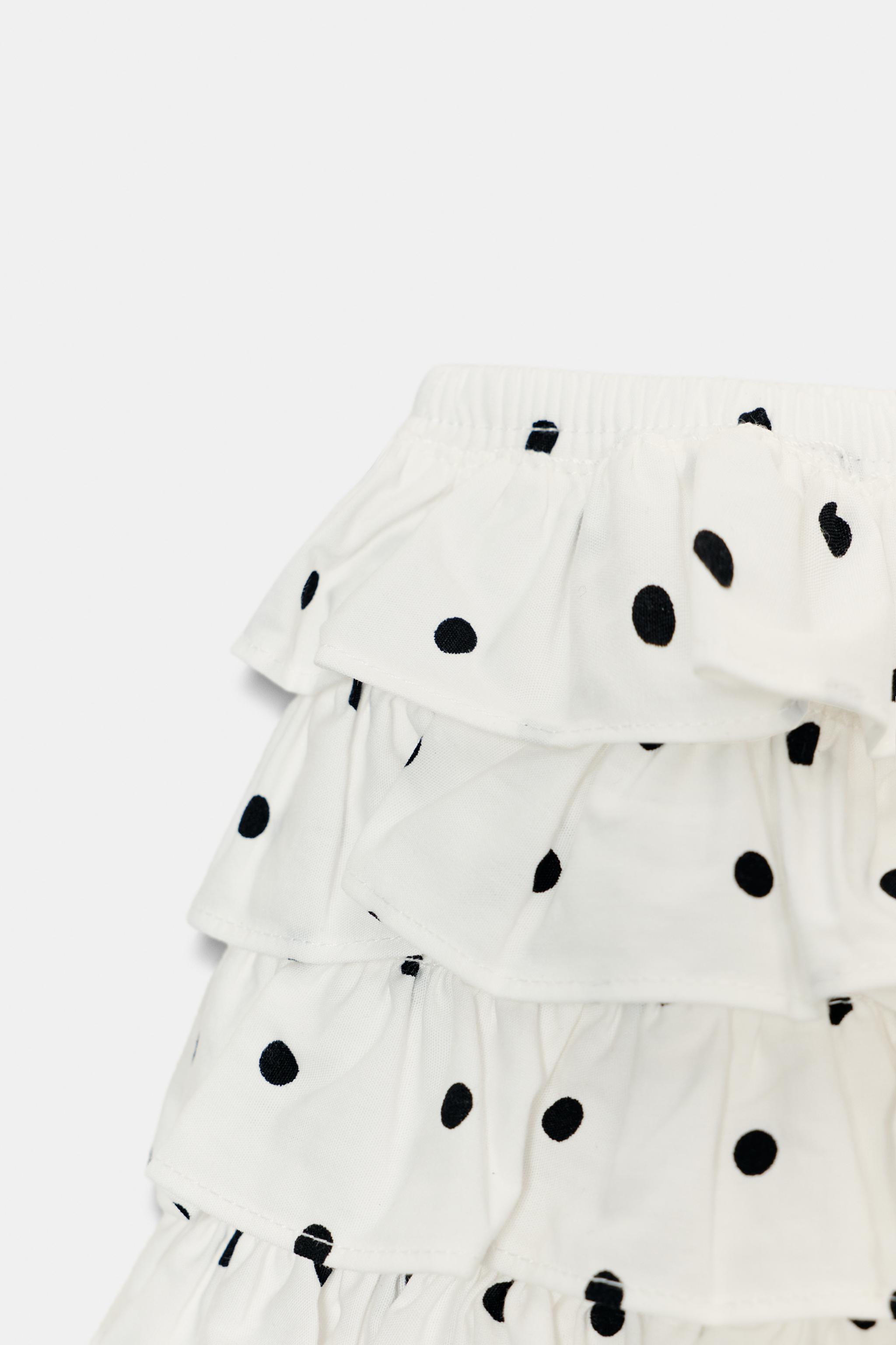 SHORT MINI À VOLANTS ET POIS
